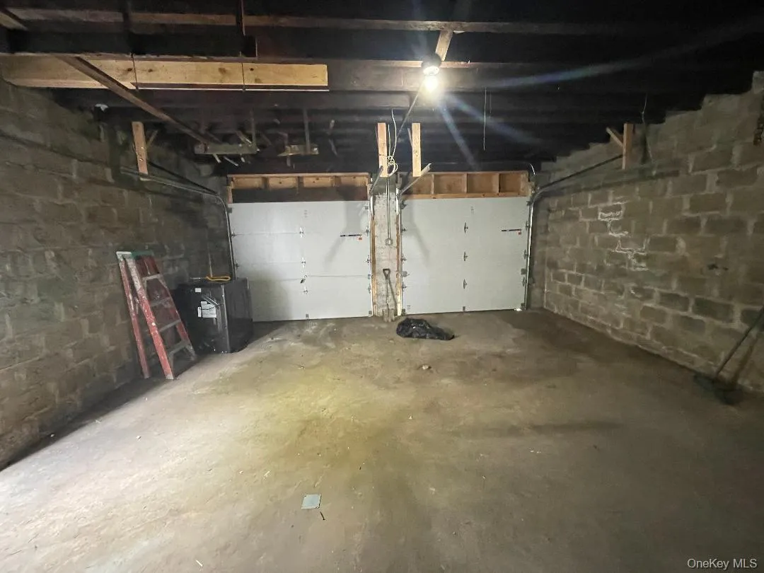 Interior of Two Car Garage and Doors Interior of Two Car Garage and Doors
