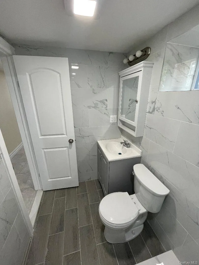 Full Bathroom with Vanity and Toilet Full Bathroom with Vanity and Toilet