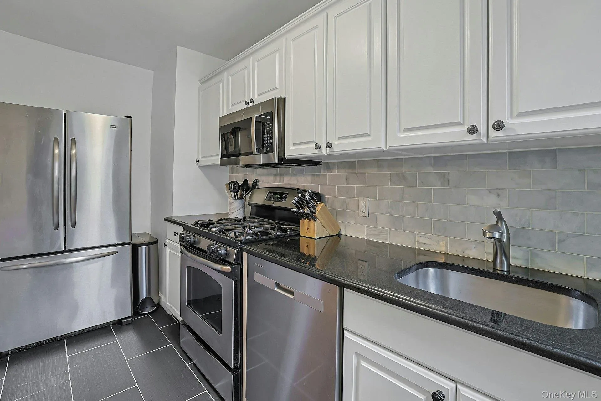 Kitchen with Modern Appliances and Lots of Storage Kitchen with Modern Appliances and Lots of Storage