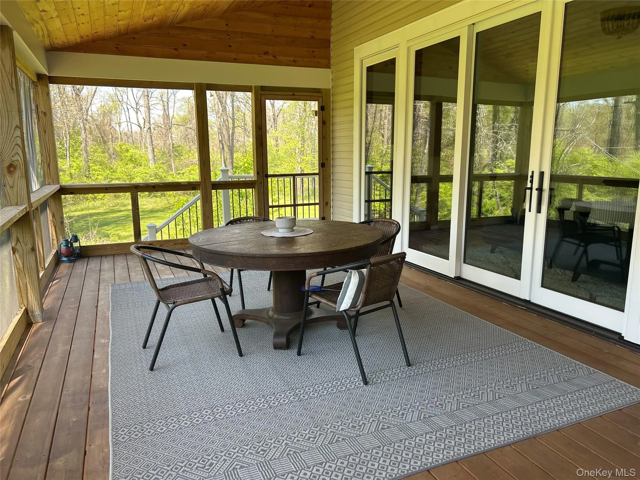Enjoy a cup of coffee in the morning or a cocktail in the afternoon in screened in porch Enjoy a cup of coffee in the morning or a cocktail in the afternoon in screened in porch