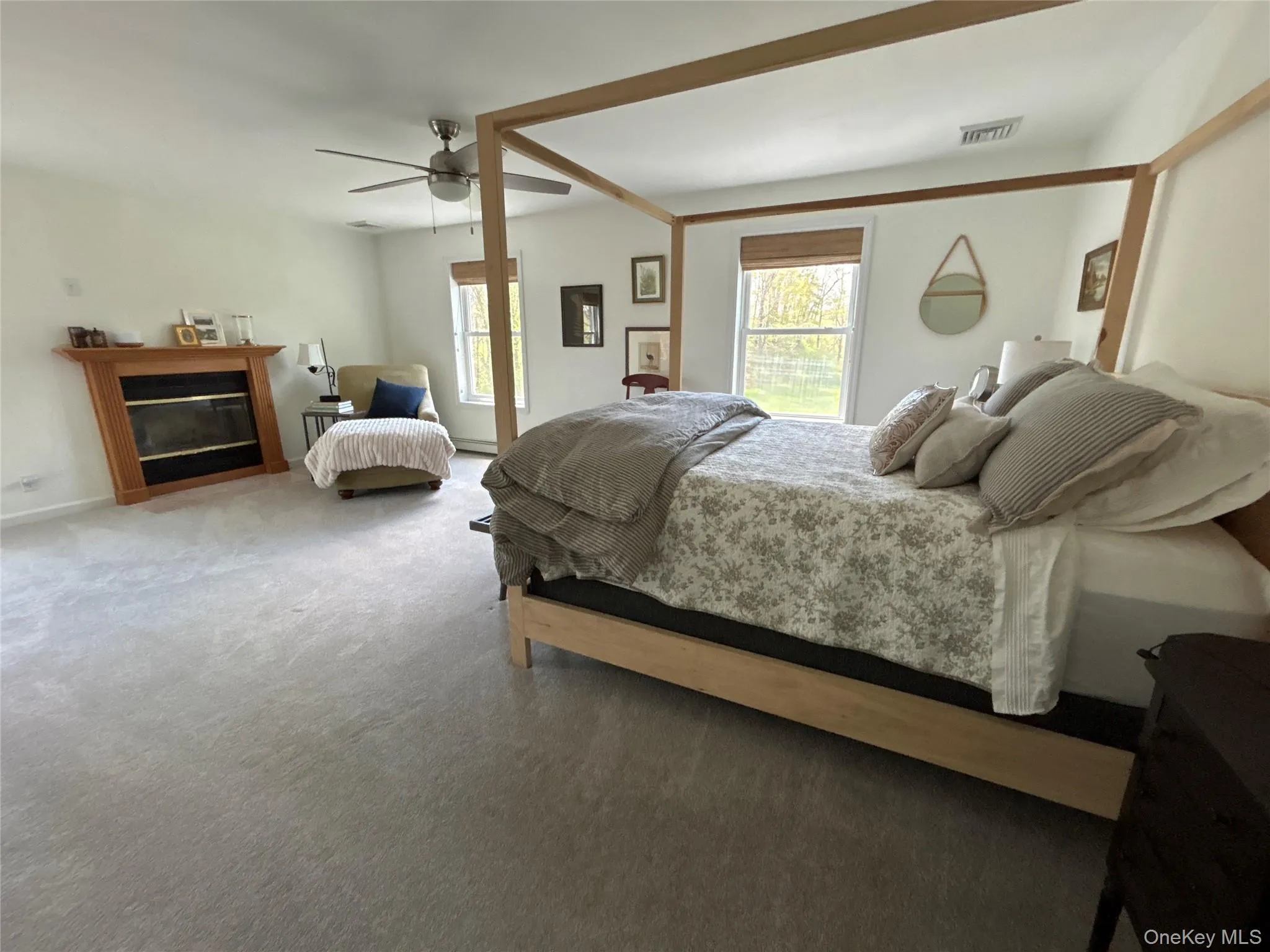 Spacious Primary with fireplace, large walk in closet. Primary bath with soaking tub, shower and double sink vanity Spacious Primary with fireplace, large walk in closet. Primary bath with soaking tub, shower and double sink vanity