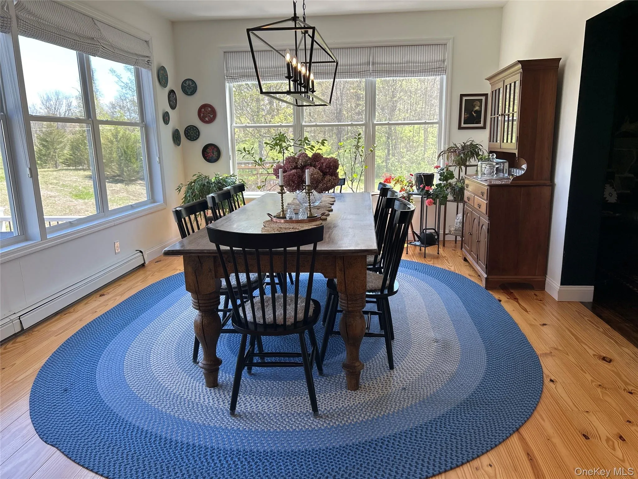 Light and bright dining area overlooking backyard Light and bright dining area overlooking backyard