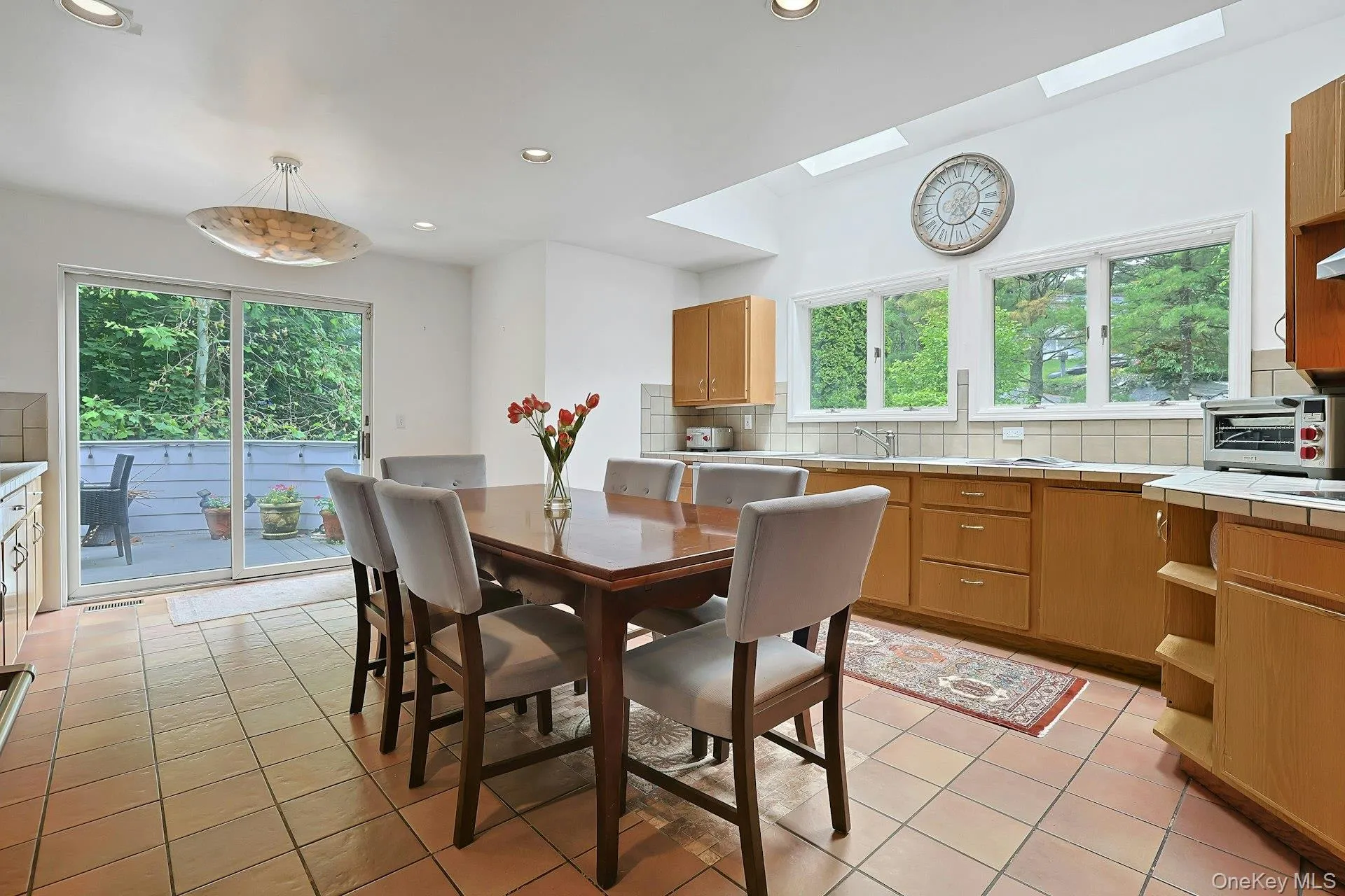 Large, eat in kitchen with sliders to one of many decks Large, eat in kitchen with sliders to one of many decks