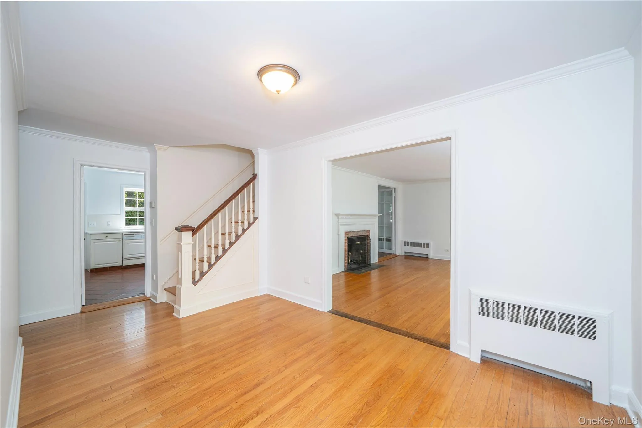 Large entry foyer and wood floors throughout. Large entry foyer and wood floors throughout.