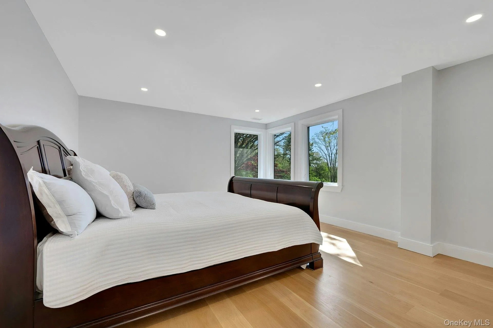 Fourth bedroom with large windows overlooking the breathtaking grounds and reservoir Fourth bedroom with large windows overlooking the breathtaking grounds and reservoir