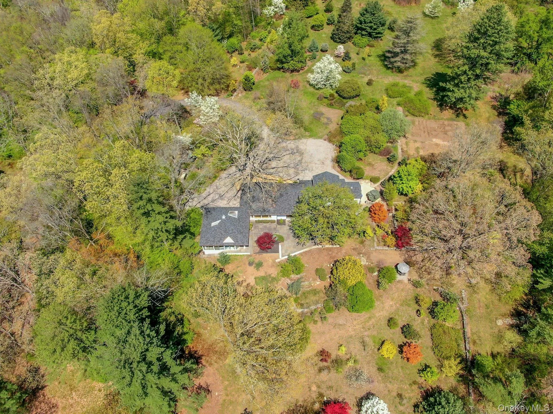 Arial view - Colorful trees punctuate the property Arial view - Colorful trees punctuate the property