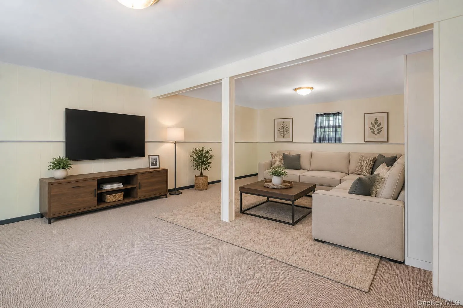 Carpeted recreation area featuring recessed lighting and a neutral color palette Carpeted recreation area featuring recessed lighting and a neutral color palette