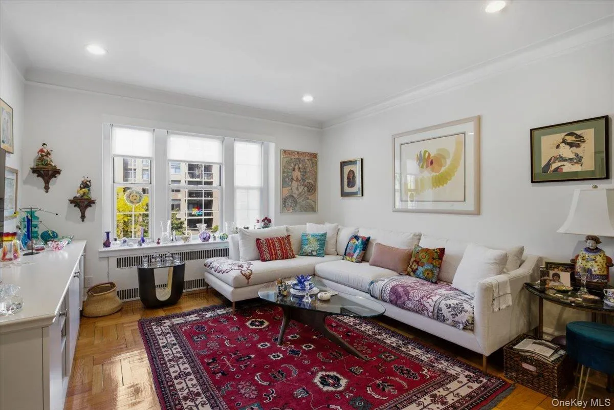 The sun-filled living room designed to exude warmth from the moment you walk in. The sun-filled living room designed to exude warmth from the moment you walk in.
