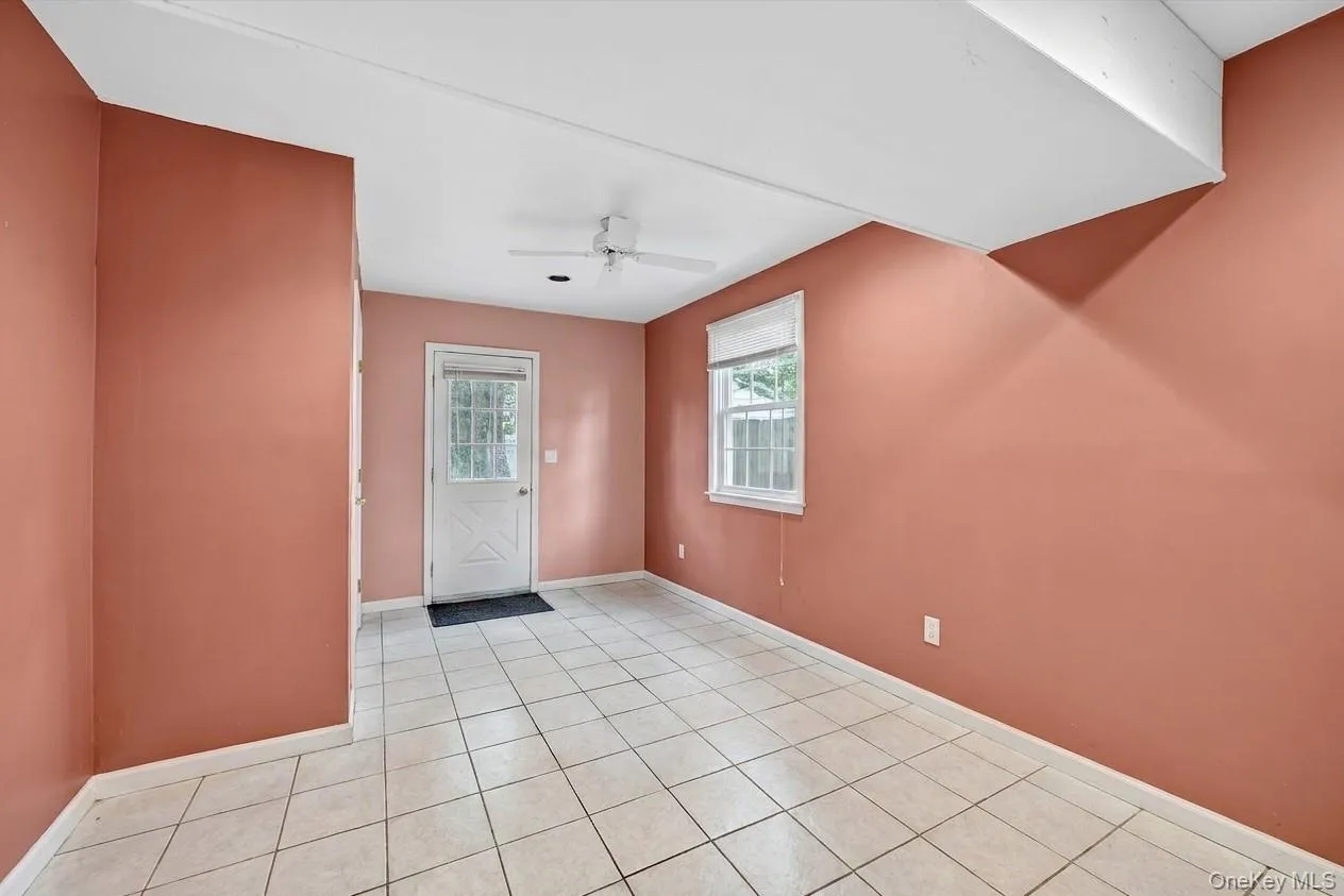 Bonus room with light tile patterned floors Bonus room with light tile patterned floors