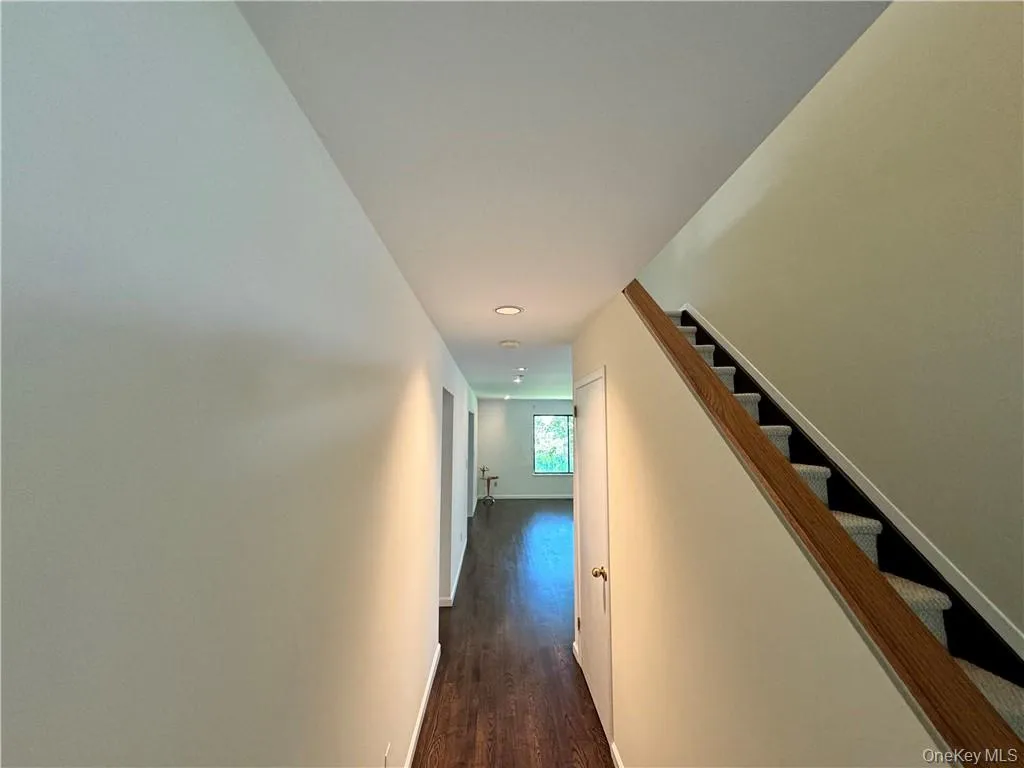 Hall featuring gorgeous new wood flooring Hall featuring gorgeous new wood flooring