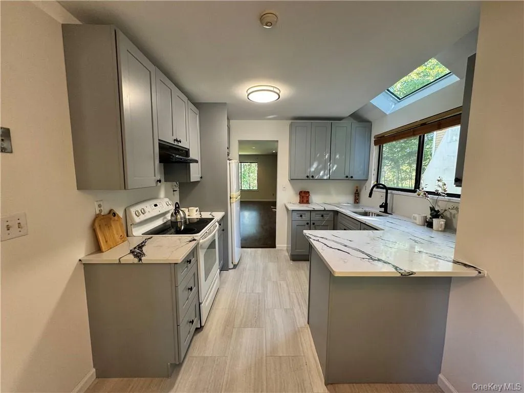 Kitchen flows beautifully into spacious dining and living room Kitchen flows beautifully into spacious dining and living room