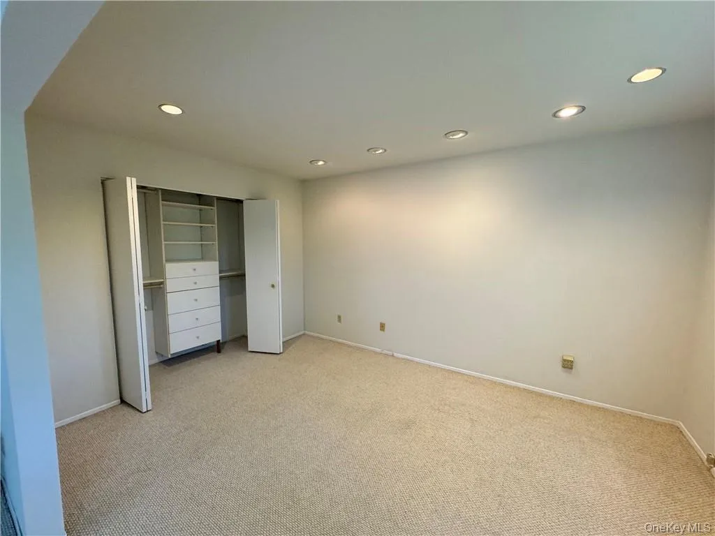 Large bonus room attached to primary suite, has generously sized closet Large bonus room attached to primary suite, has generously sized closet