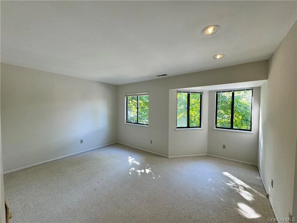 Second spacious bedroom with large windows providing an abundance of natural light Second spacious bedroom with large windows providing an abundance of natural light