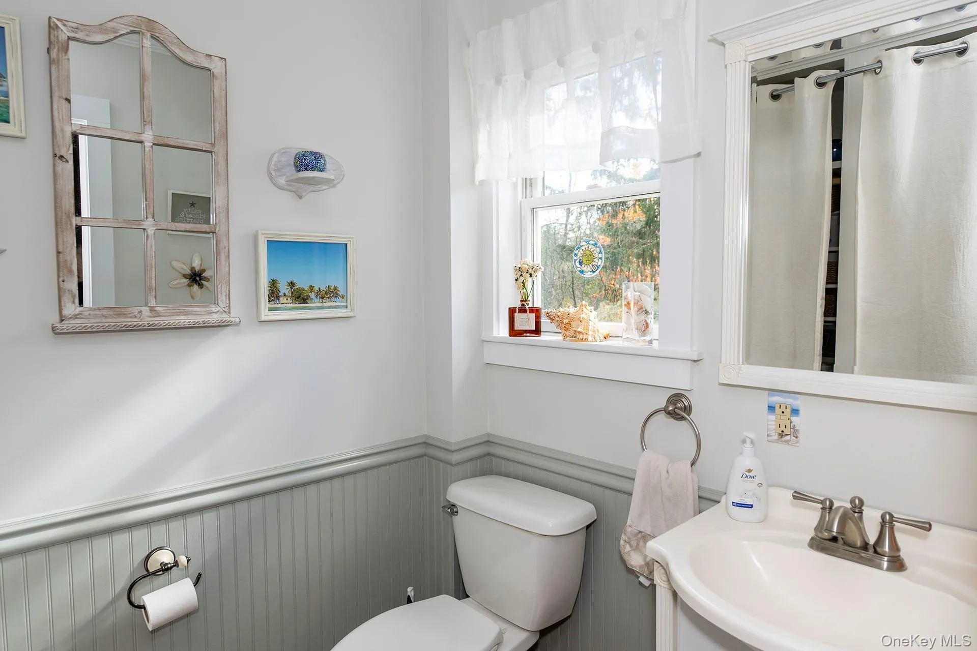 Powder room with laundry off mudroom Powder room with laundry off mudroom