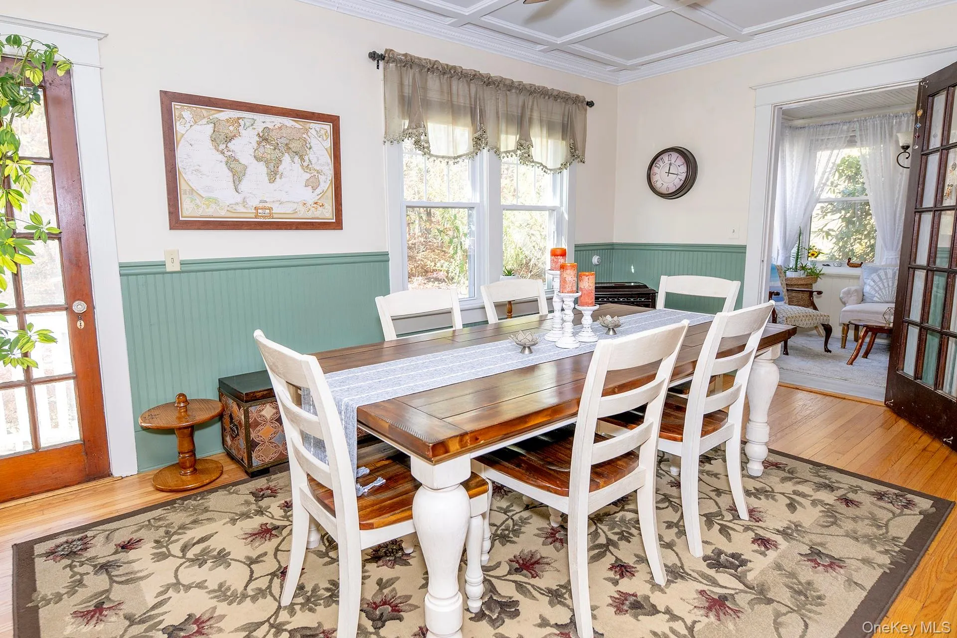 Dining room with glass door to cozy sun room Dining room with glass door to cozy sun room