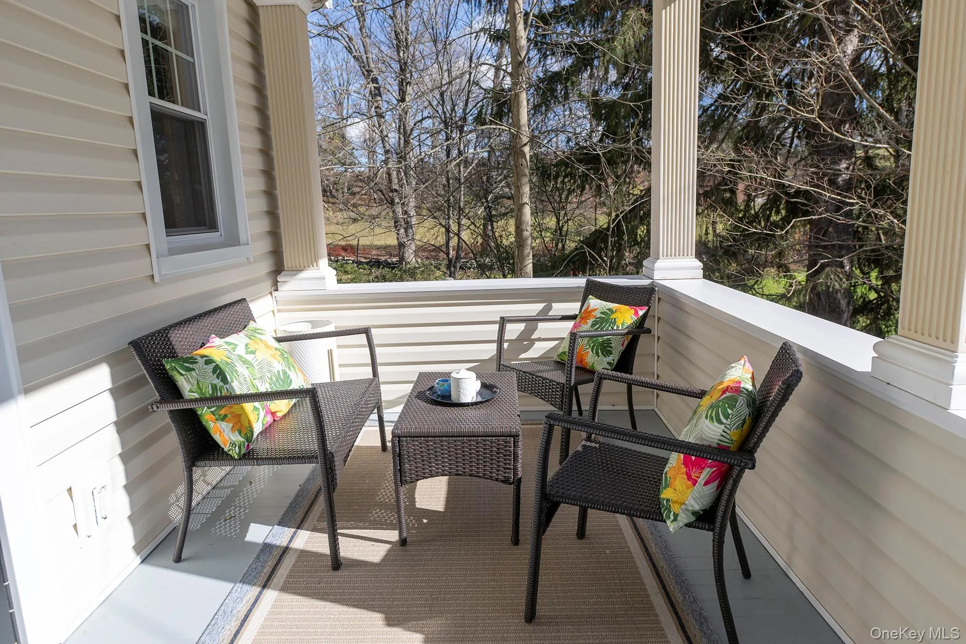 Side covered porch overlooking yard Side covered porch overlooking yard