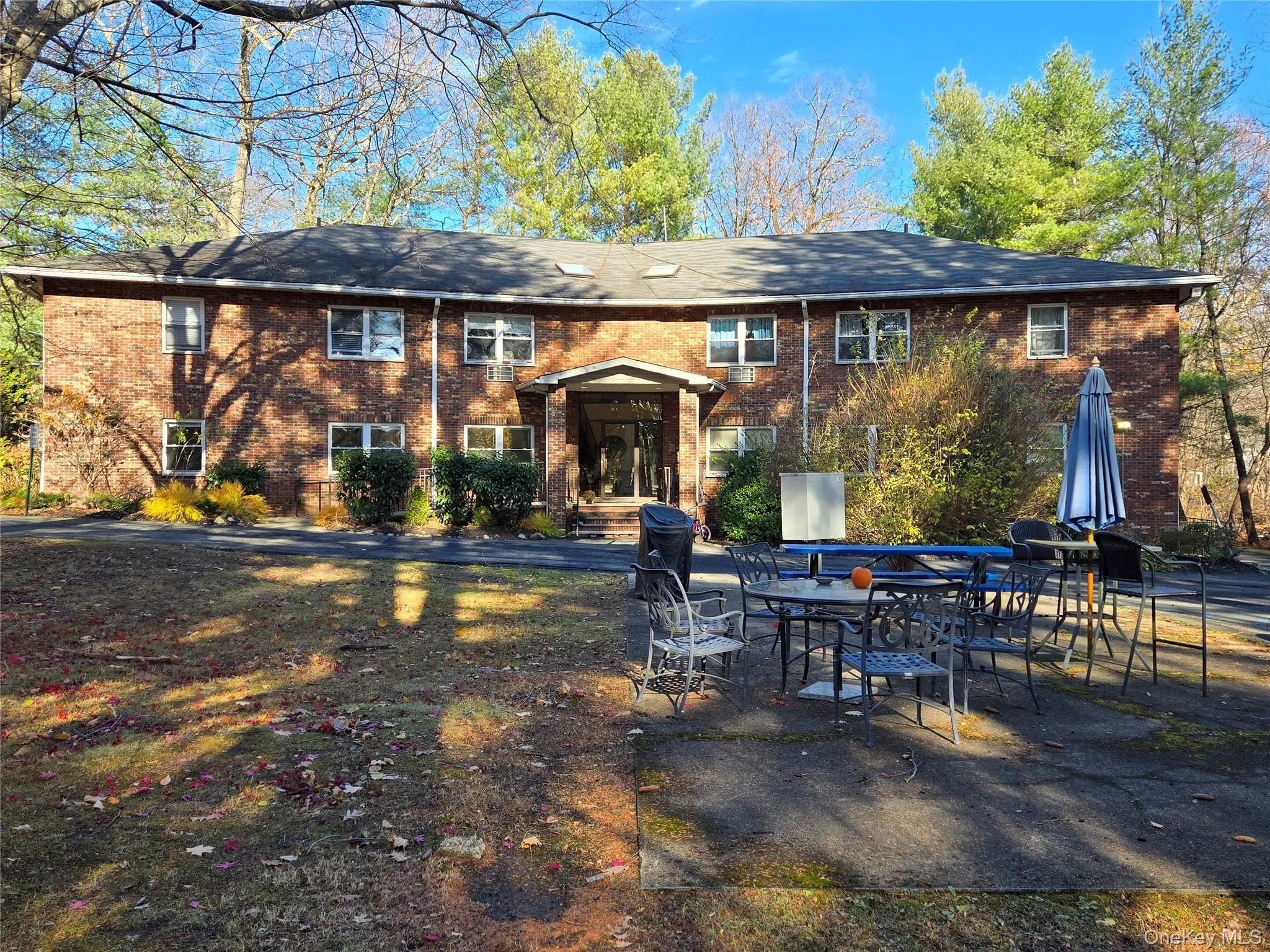 Back of property featuring a patio Back of property featuring a patio