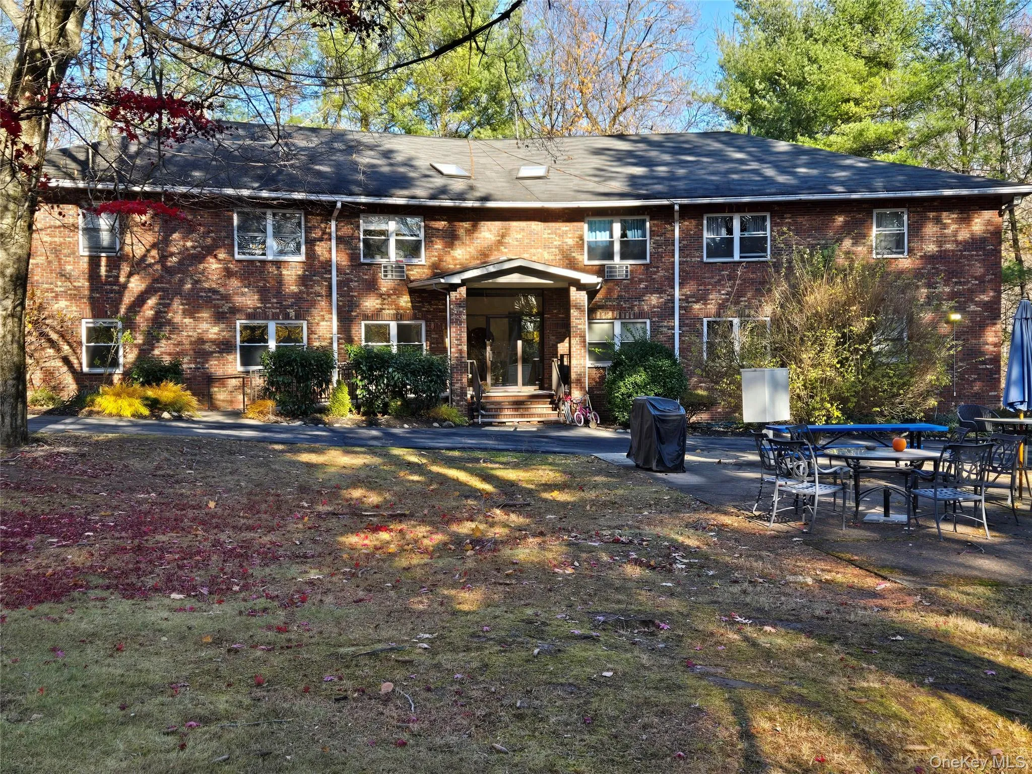 View of front of house featuring a patio area View of front of house featuring a patio area