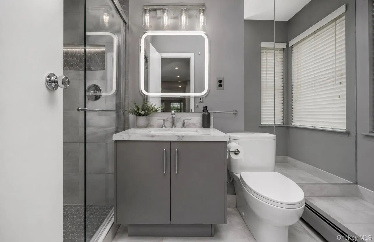 Primary bathroom staged to look modern Primary bathroom staged to look modern