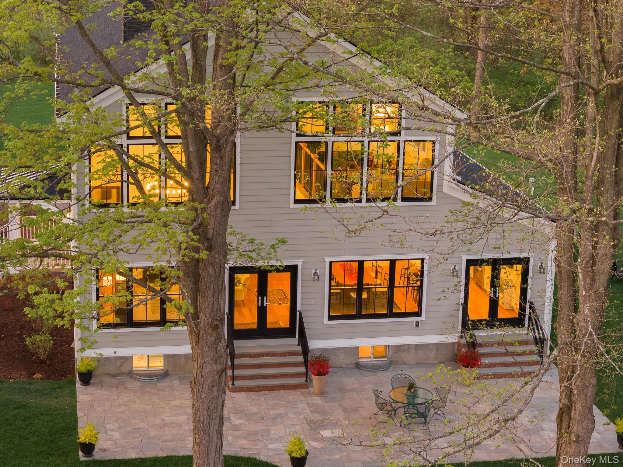 Aerial view of the southern side of the house and patio Aerial view of the southern side of the house and patio