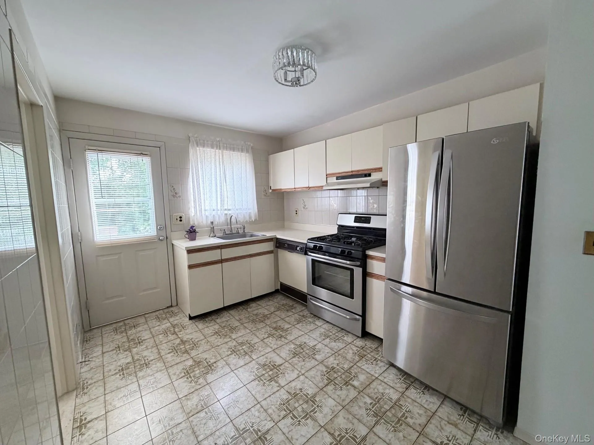 Kitchen with door to back deck Kitchen with door to back deck