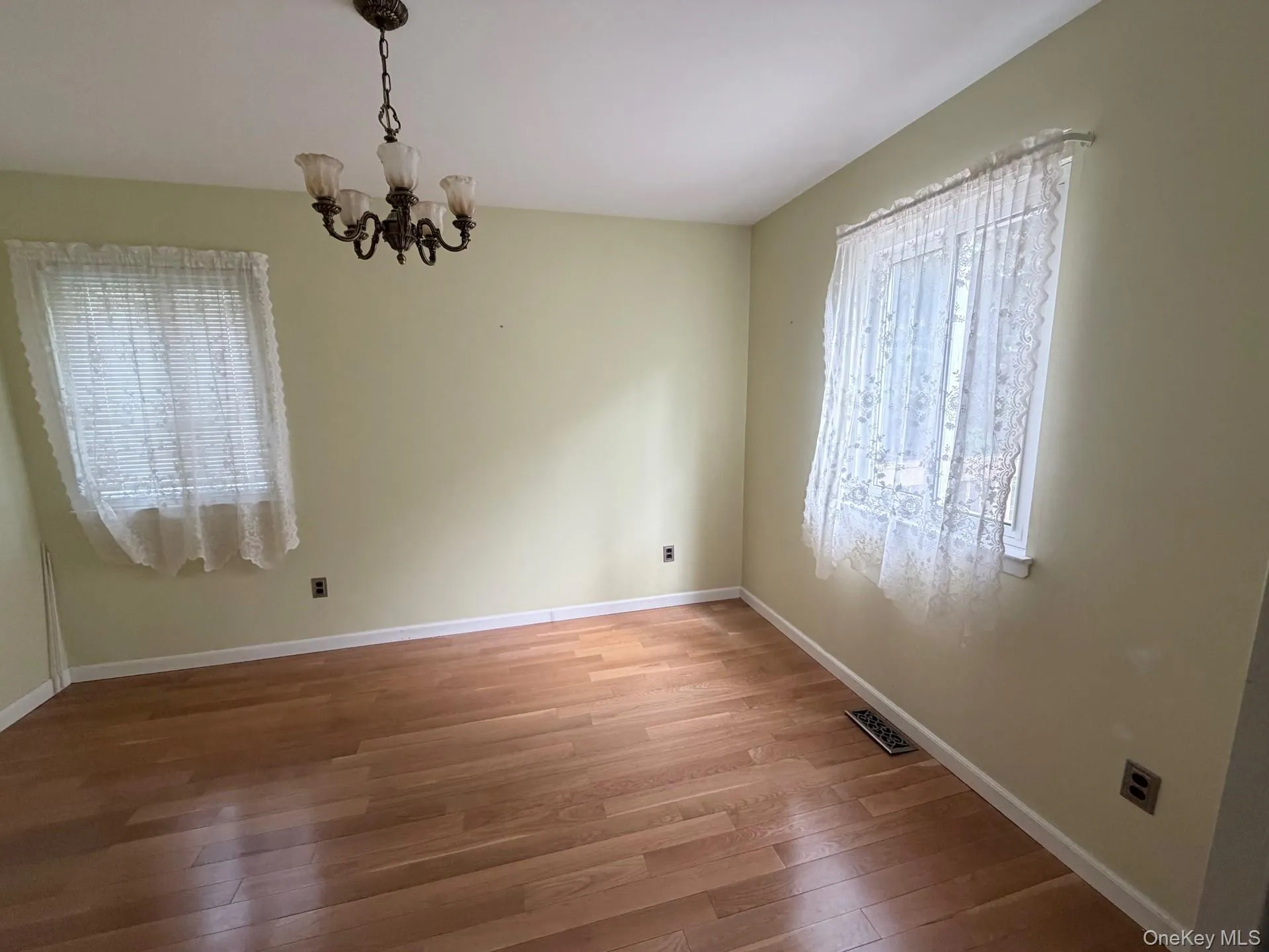 Makeshift first floor bedroom. Wall can be taken down to turn back into dining room Makeshift first floor bedroom. Wall can be taken down to turn back into dining room