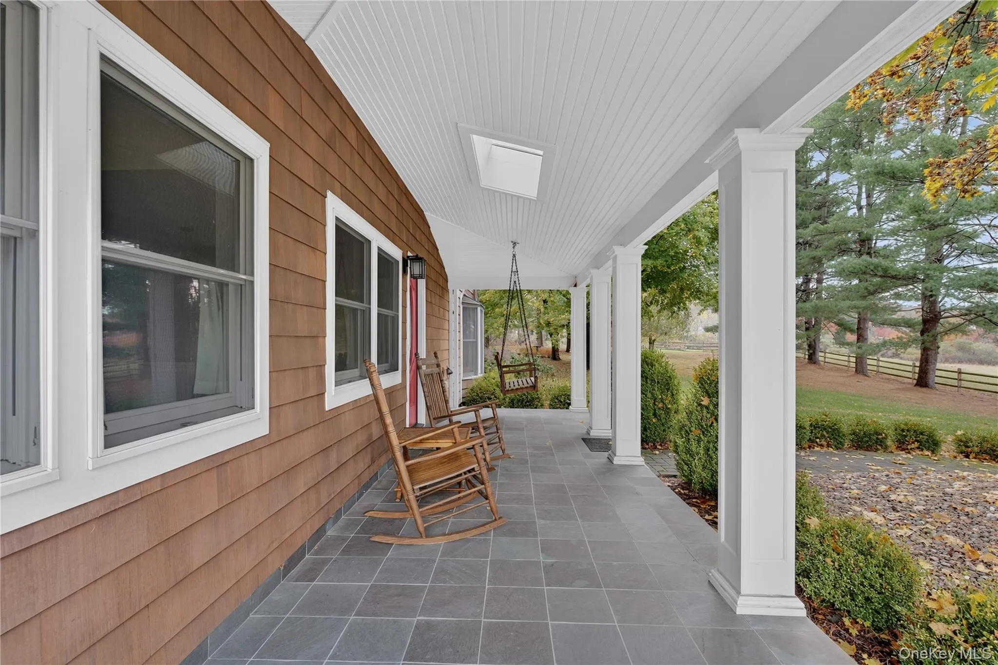 Relax on the covered front porch and take in the views! Relax on the covered front porch and take in the views!
