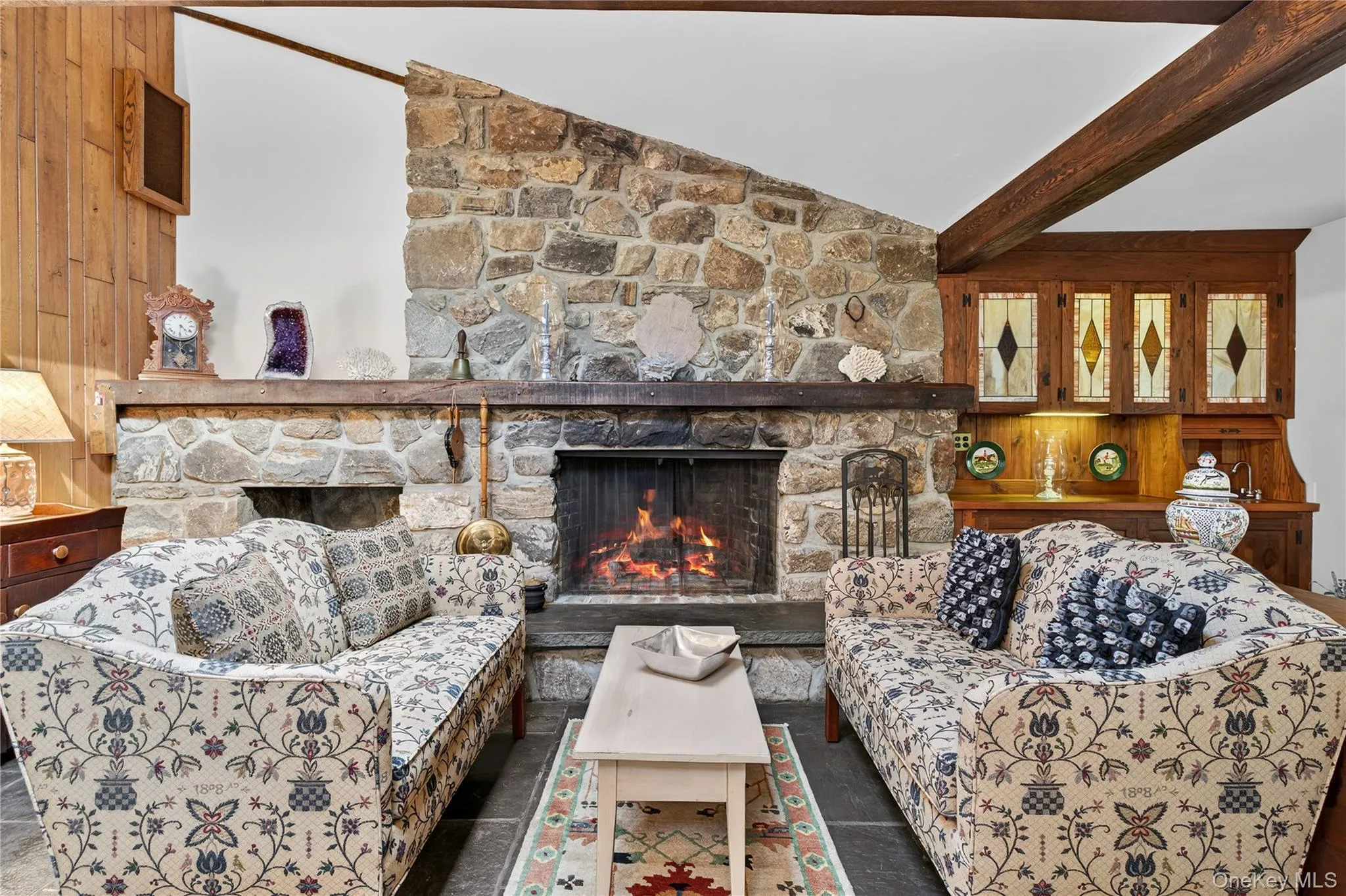 A fireside reading/lounging area, or furnish as the formal dining area. A fireside reading/lounging area, or furnish as the formal dining area.