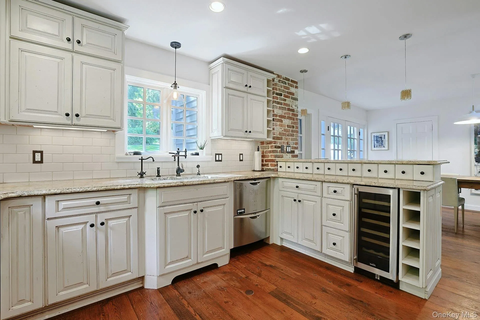 The kitchen is perfectly positioned near the dining area and patio, creating an easy flow for entertaining, and gathering with family and friends. The kitchen is perfectly positioned near the dining area and patio, creating an easy flow for entertaining, and gathering with family and friends.