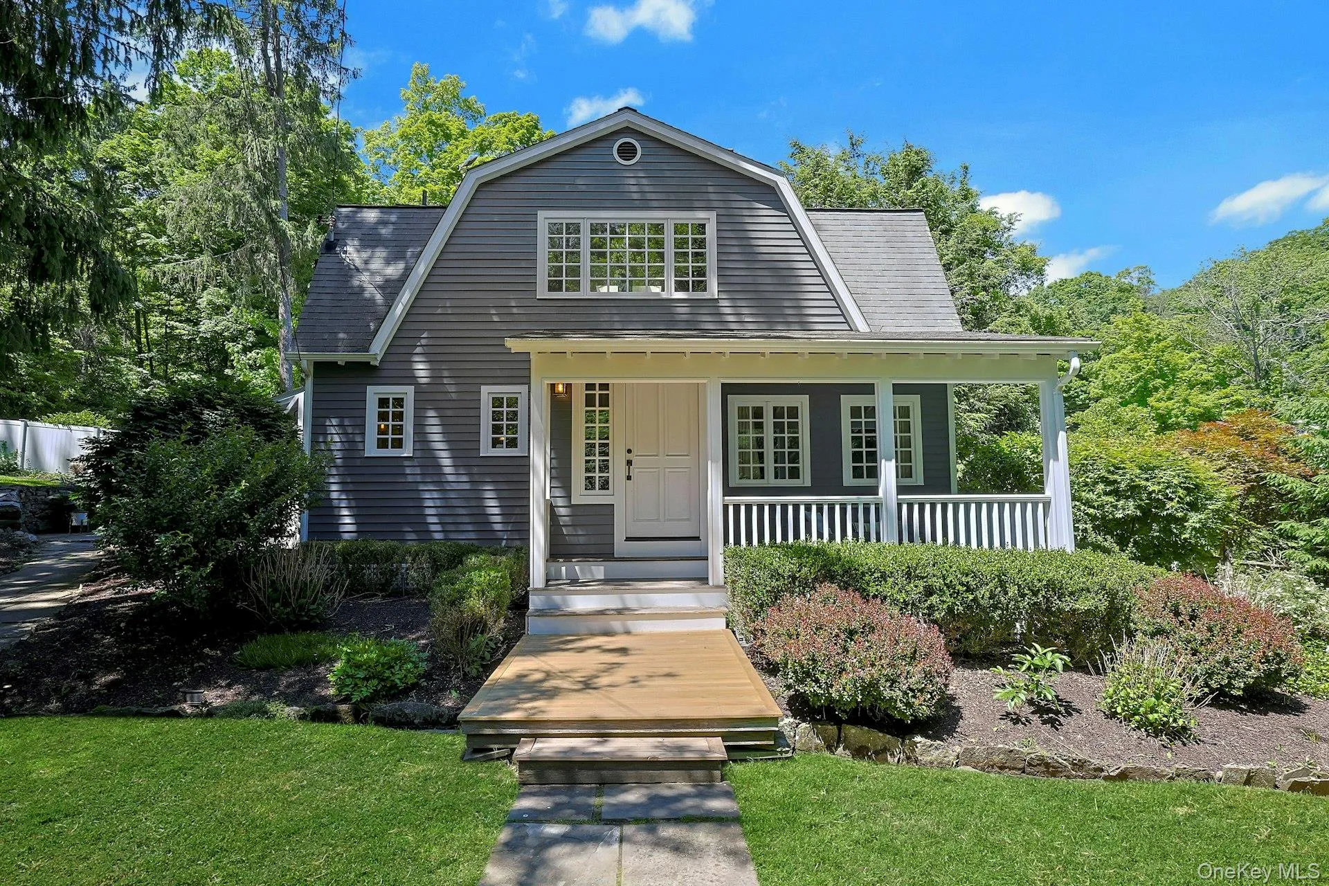 A welcoming front door, entry and porch are classic 1930s charm. A welcoming front door, entry and porch are classic 1930s charm.