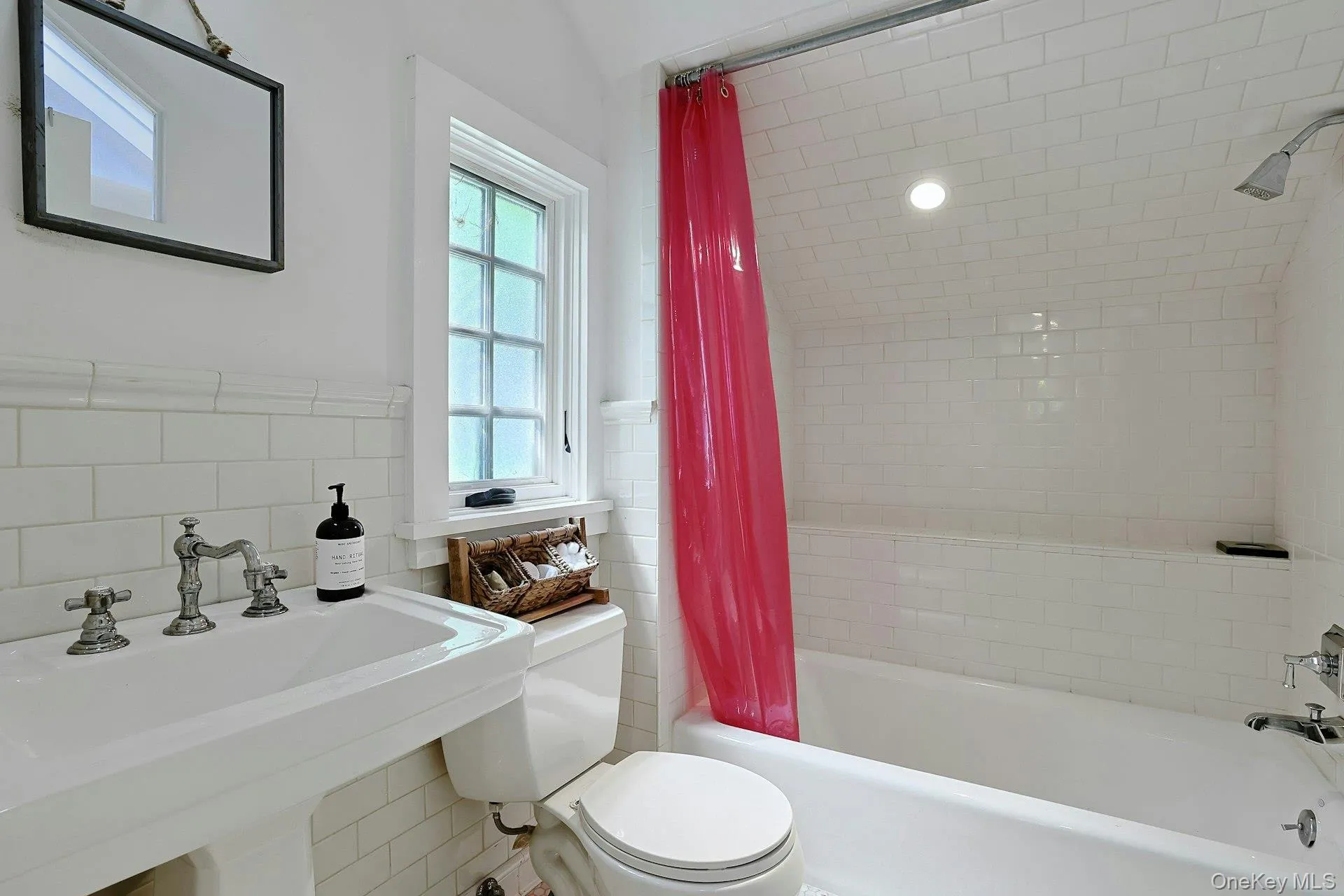 A beautifully appointed first-floor full bathroom adds comfort and convenience to the home, offering easy access for guests and everyday living. A beautifully appointed first-floor full bathroom adds comfort and convenience to the home, offering easy access for guests and everyday living.