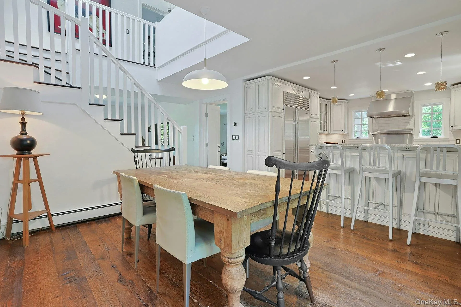 The dining area connects beautifully with the kitchen, creating an easy, inviting flow for everyday meals, casual conversation, and effortless entertaining. The dining area connects beautifully with the kitchen, creating an easy, inviting flow for everyday meals, casual conversation, and effortless entertaining.