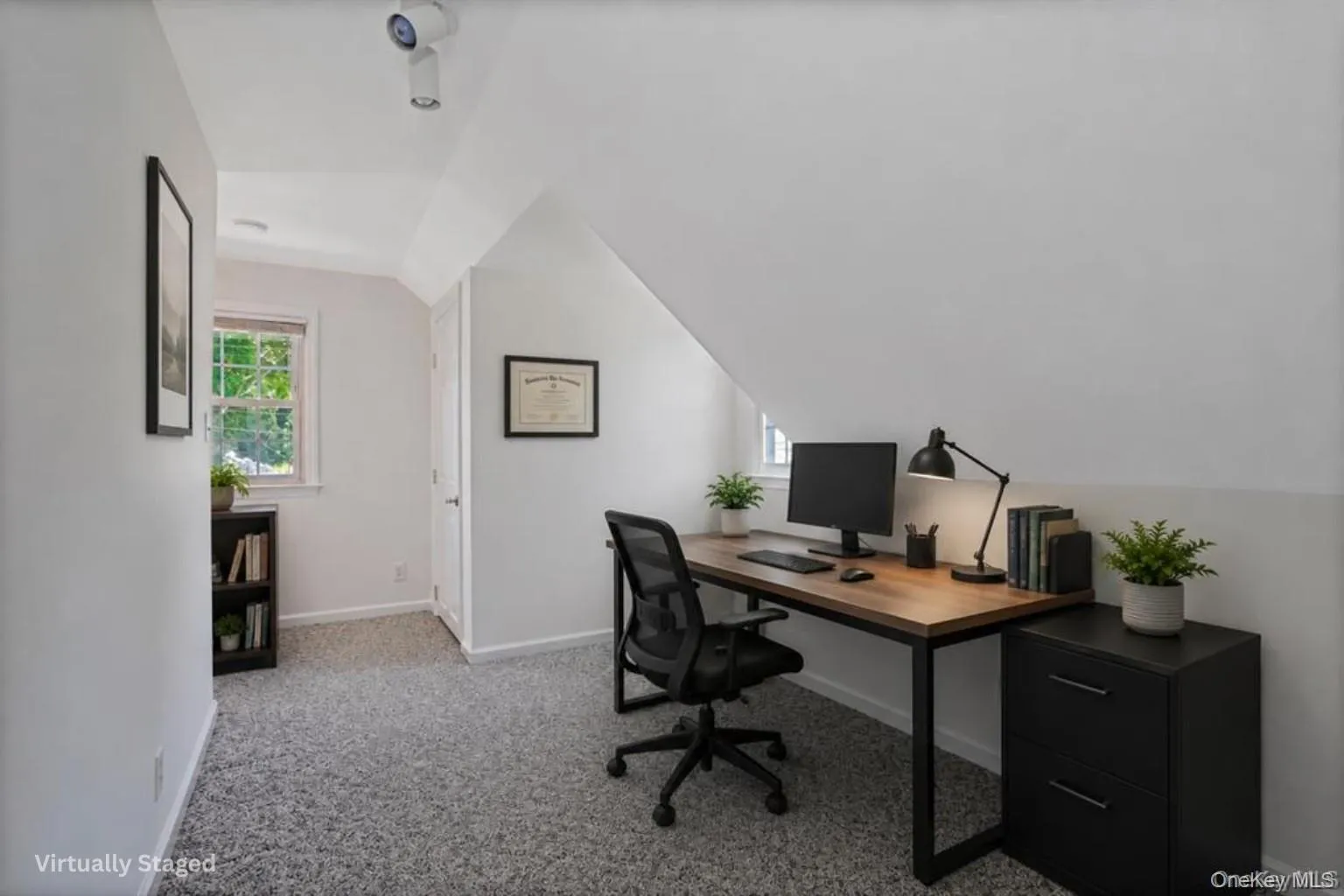 Virtually staged space upstairs that can be used as office space Virtually staged space upstairs that can be used as office space