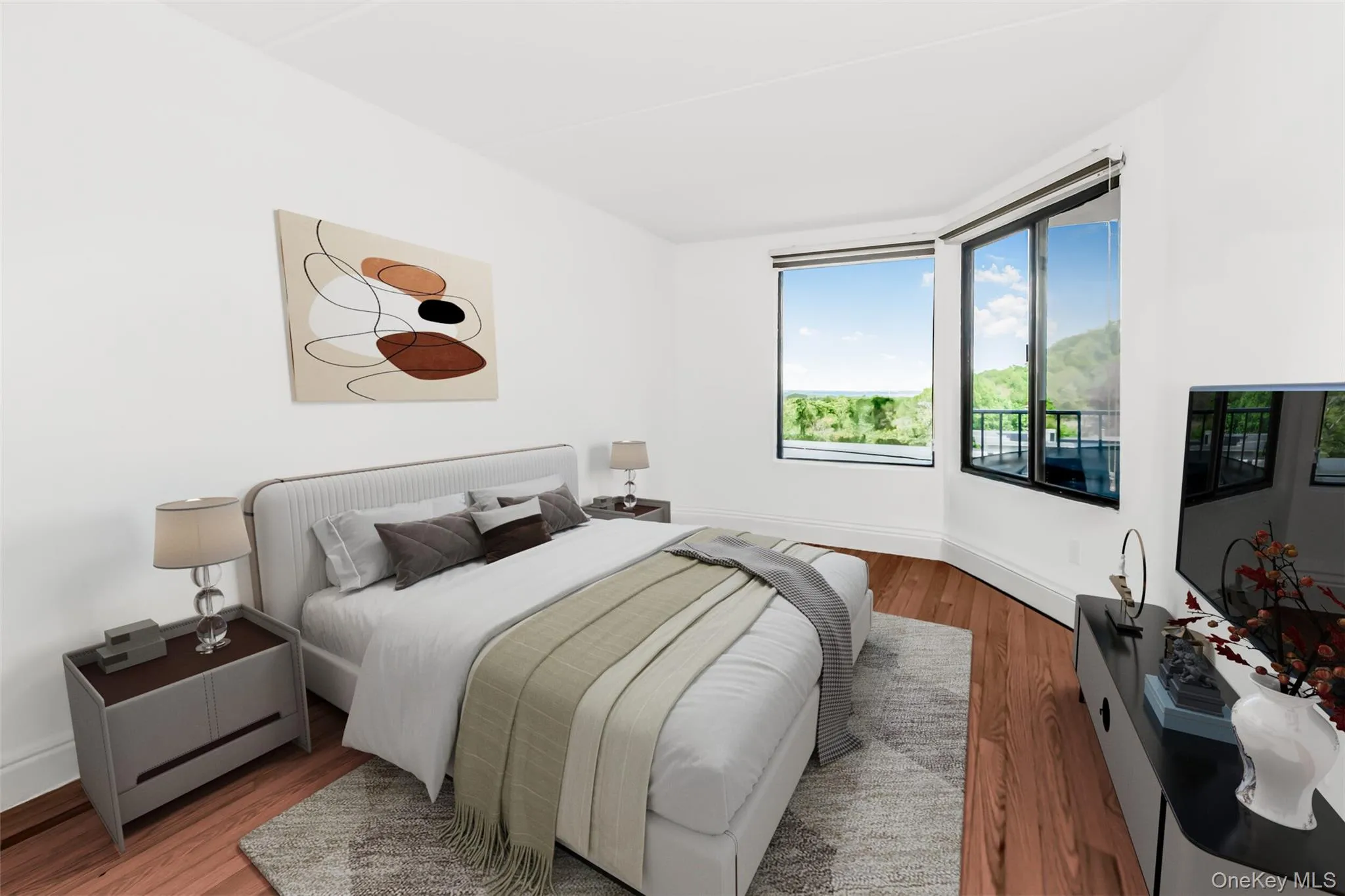 Bright bedroom featuring expansive windows with scenic outdoor Hudson River View Bright bedroom featuring expansive windows with scenic outdoor Hudson River View