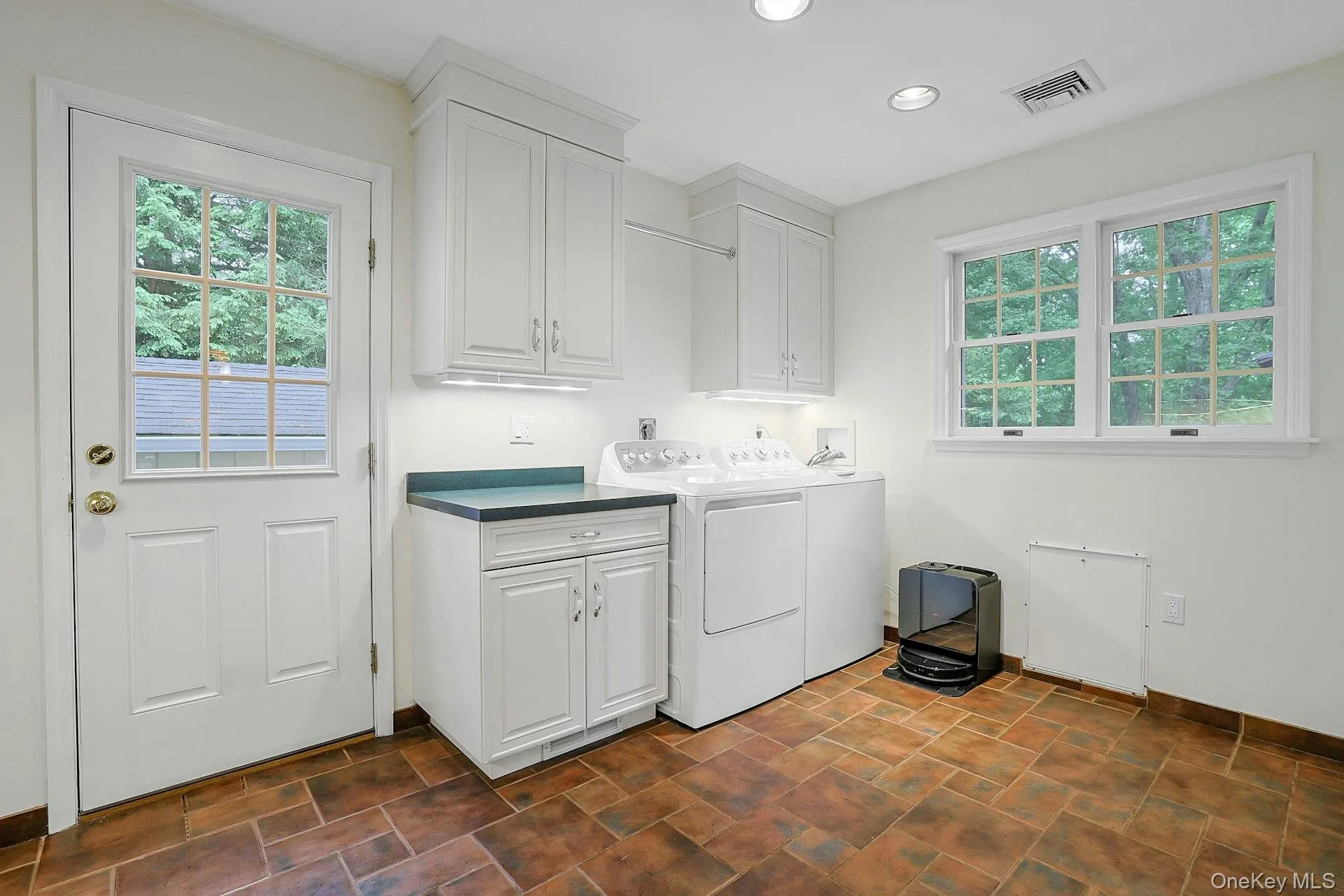 Spacious Laundry/Mudroom. Doors to outside and 2 car garage Spacious Laundry/Mudroom. Doors to outside and 2 car garage
