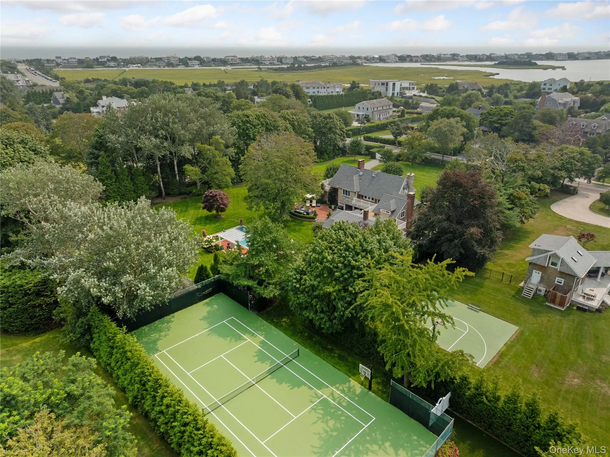 All weather tennis court newly refurbished.