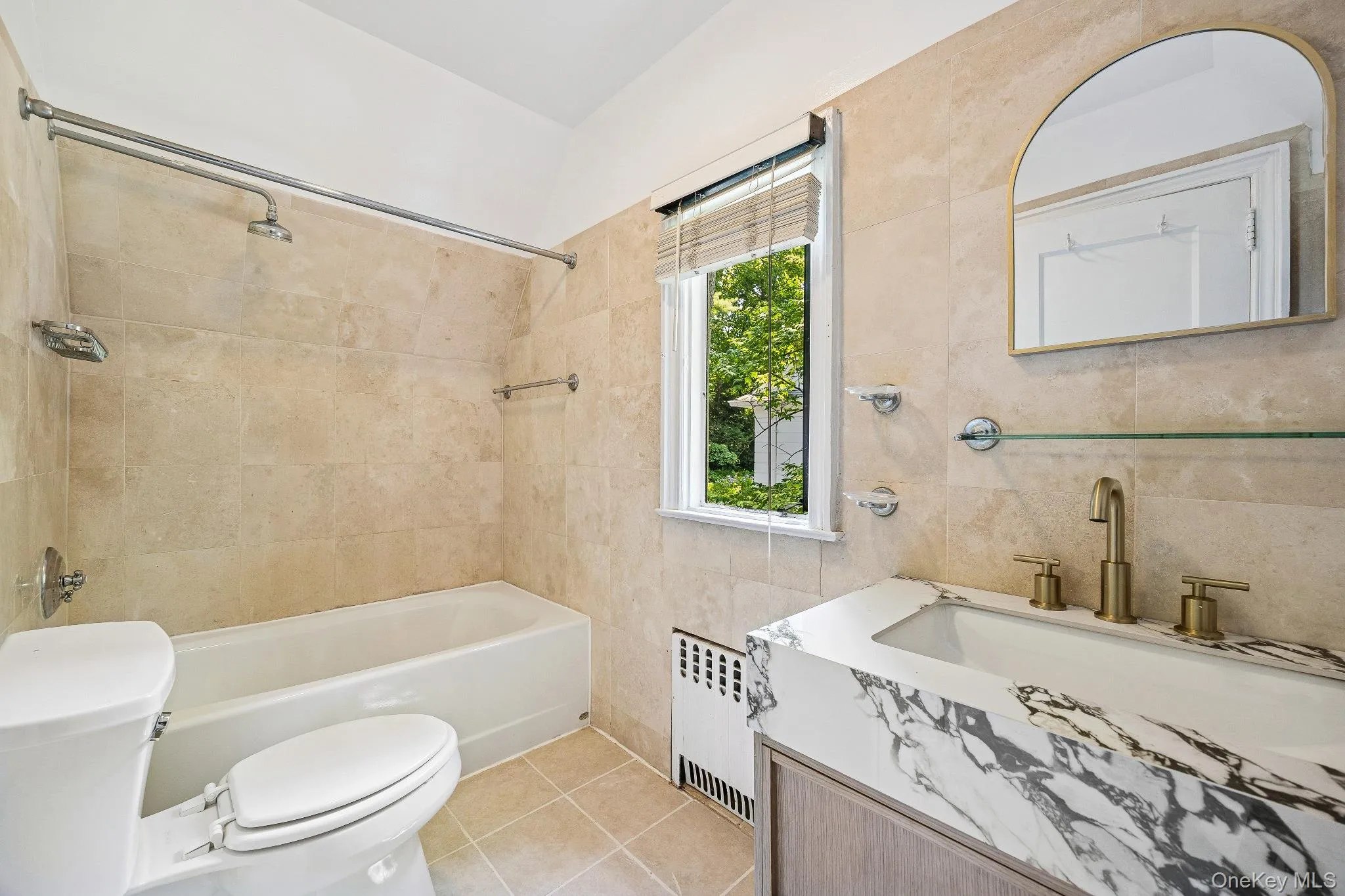 Full bath featuring tile Full bath featuring tile