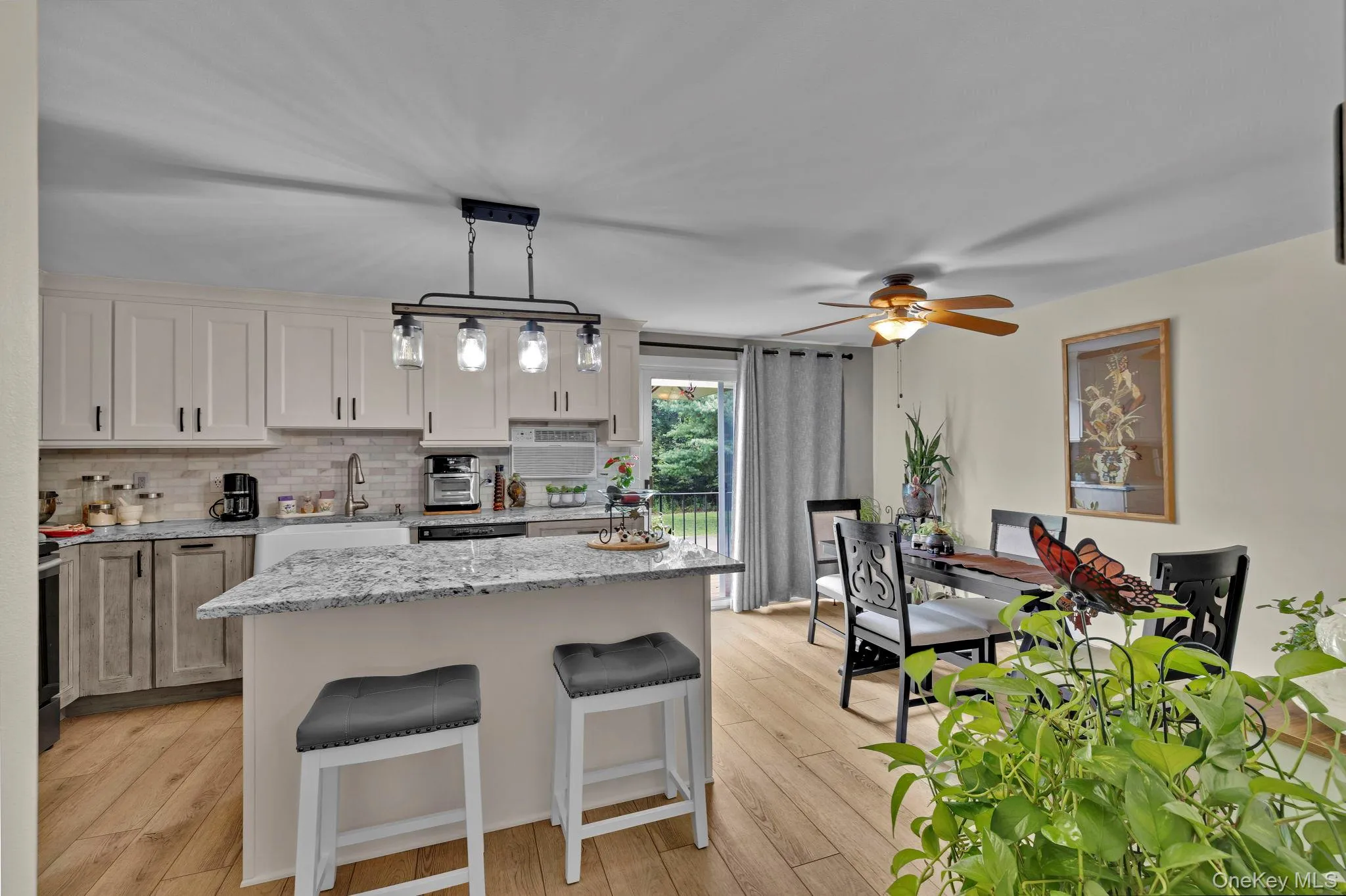 View of New Kitchen with Island, granite counters and stainless steel appliances View of New Kitchen with Island, granite counters and stainless steel appliances
