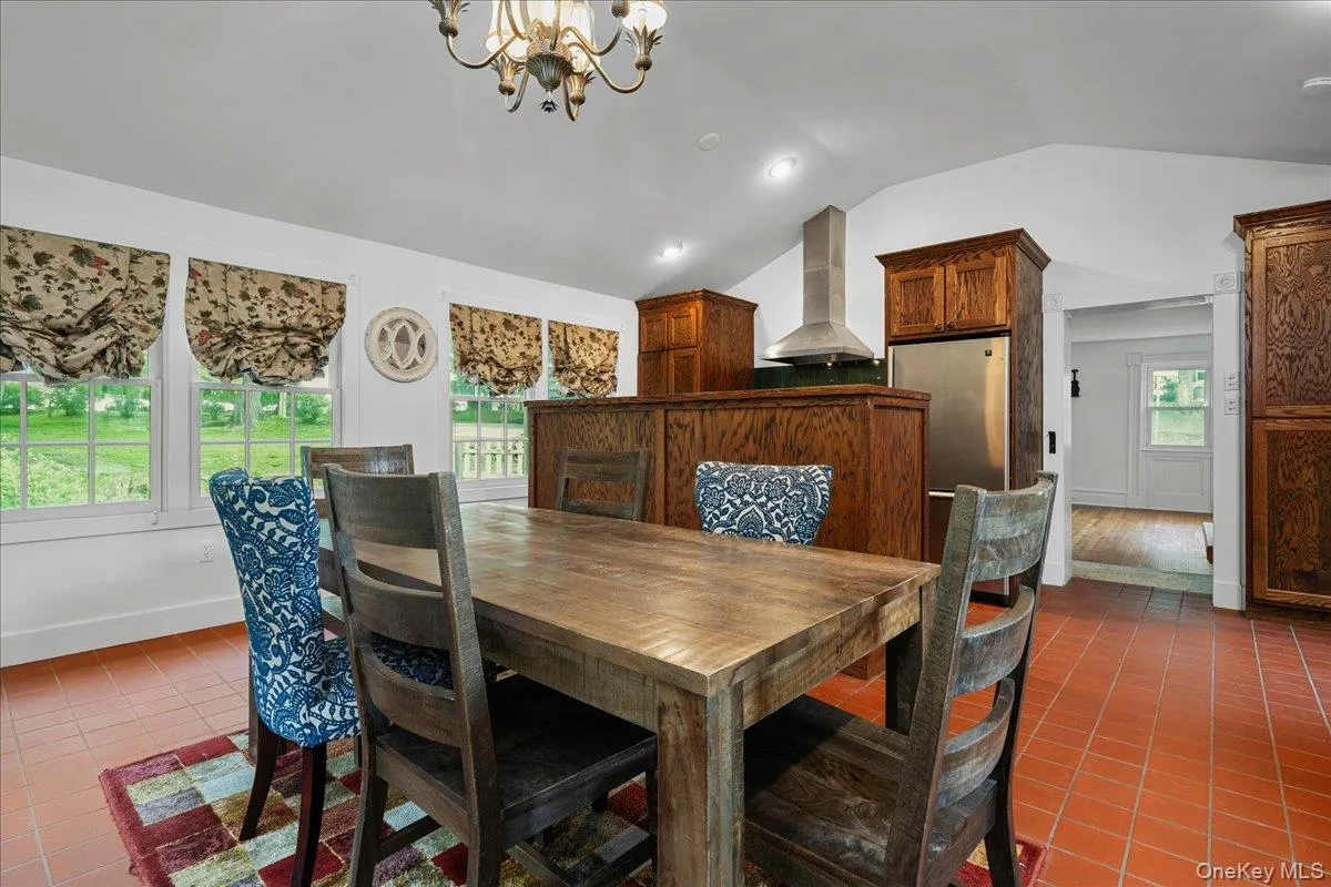Note the high ceilings. This is 19' 1" x 17' 6" wall-to-wall with beautiful, durable terra cotta flooring. Note the high ceilings. This is 19' 1" x 17' 6" wall-to-wall with beautiful, durable terra cotta flooring.
