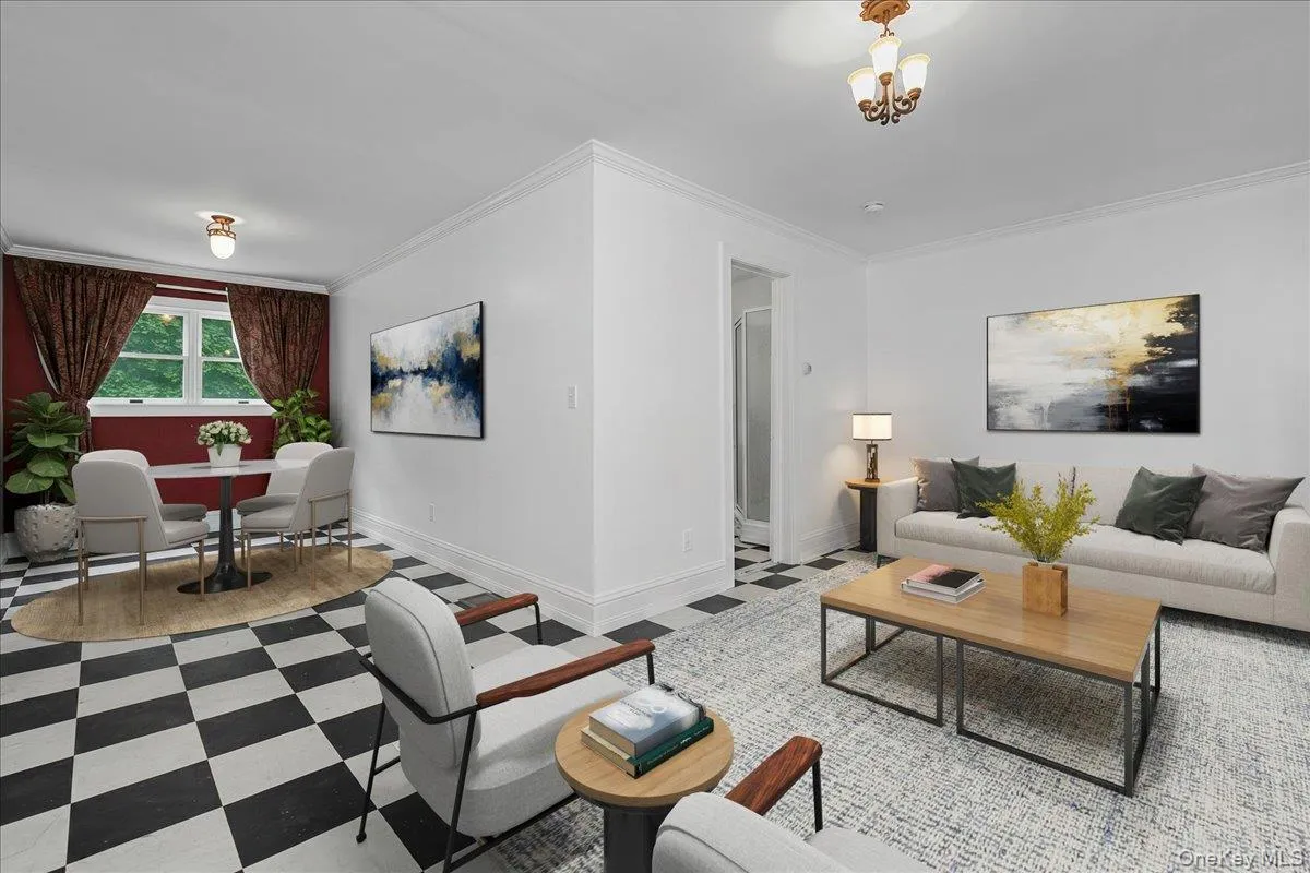 Virtually staged; next photo shows this L-shaped room is presently set up to serve as bedroom and living room as actually seen. Virtually staged; next photo shows this L-shaped room is presently set up to serve as bedroom and living room as actually seen.
