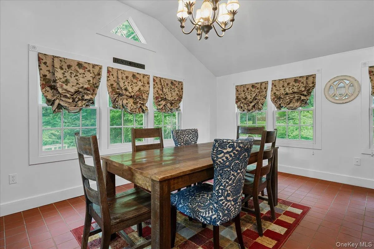 Spacious dining area and plenty of windows. Imagine the private, park-like setting. Spacious dining area and plenty of windows. Imagine the private, park-like setting.