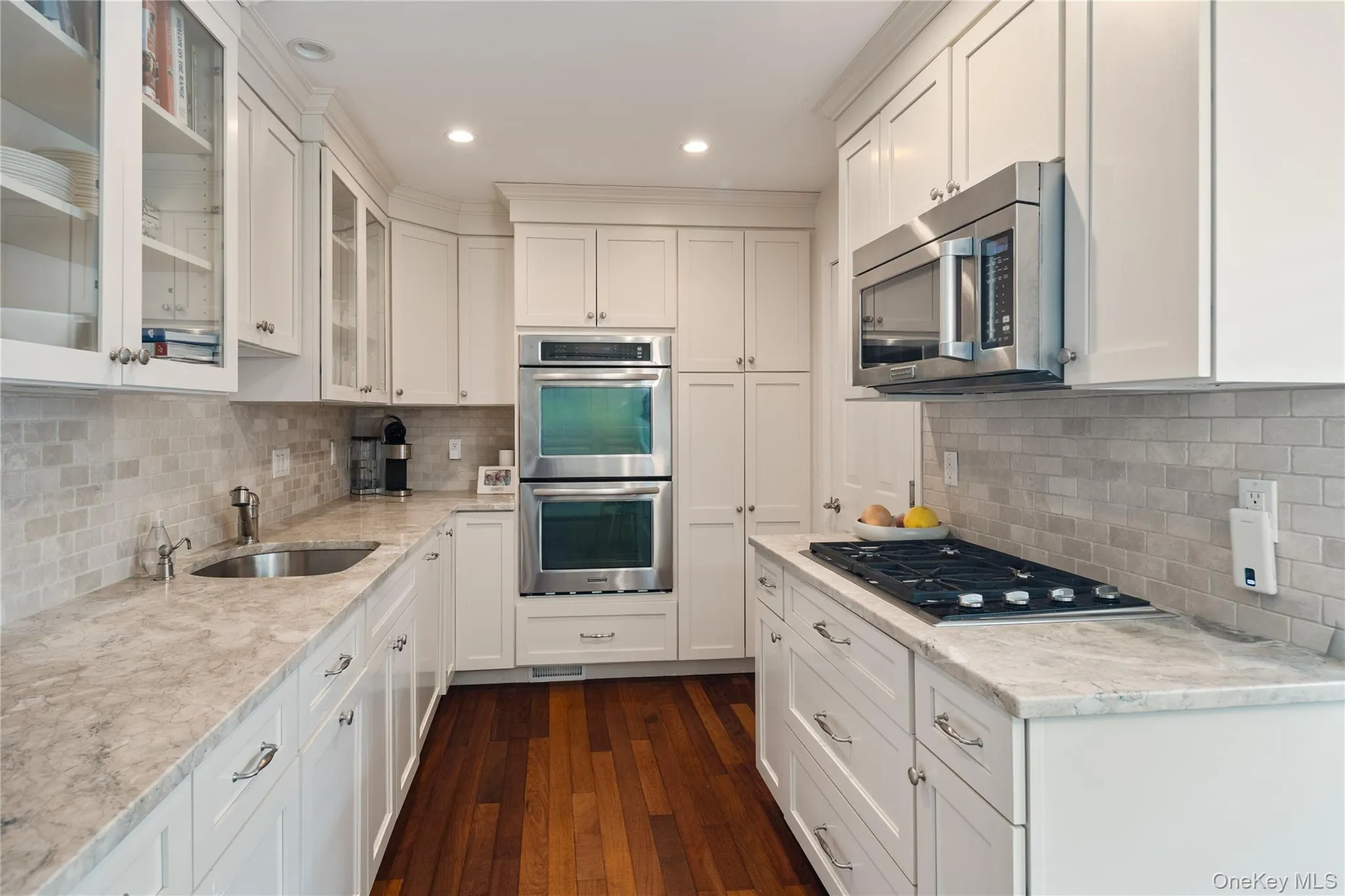 Updated Kitchen with stainless appliances, marble backsplash and limestone countertops. Updated Kitchen with stainless appliances, marble backsplash and limestone countertops.