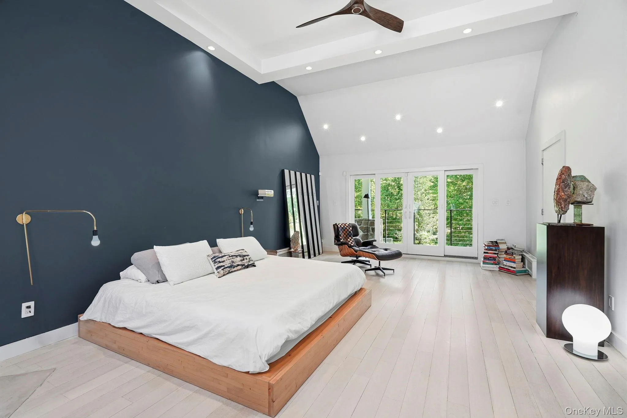Light-filled and inviting with direct access to a walk-out wraparound terrace overlooking the garden, ideal for indoor-outdoor living Light-filled and inviting with direct access to a walk-out wraparound terrace overlooking the garden, ideal for indoor-outdoor living