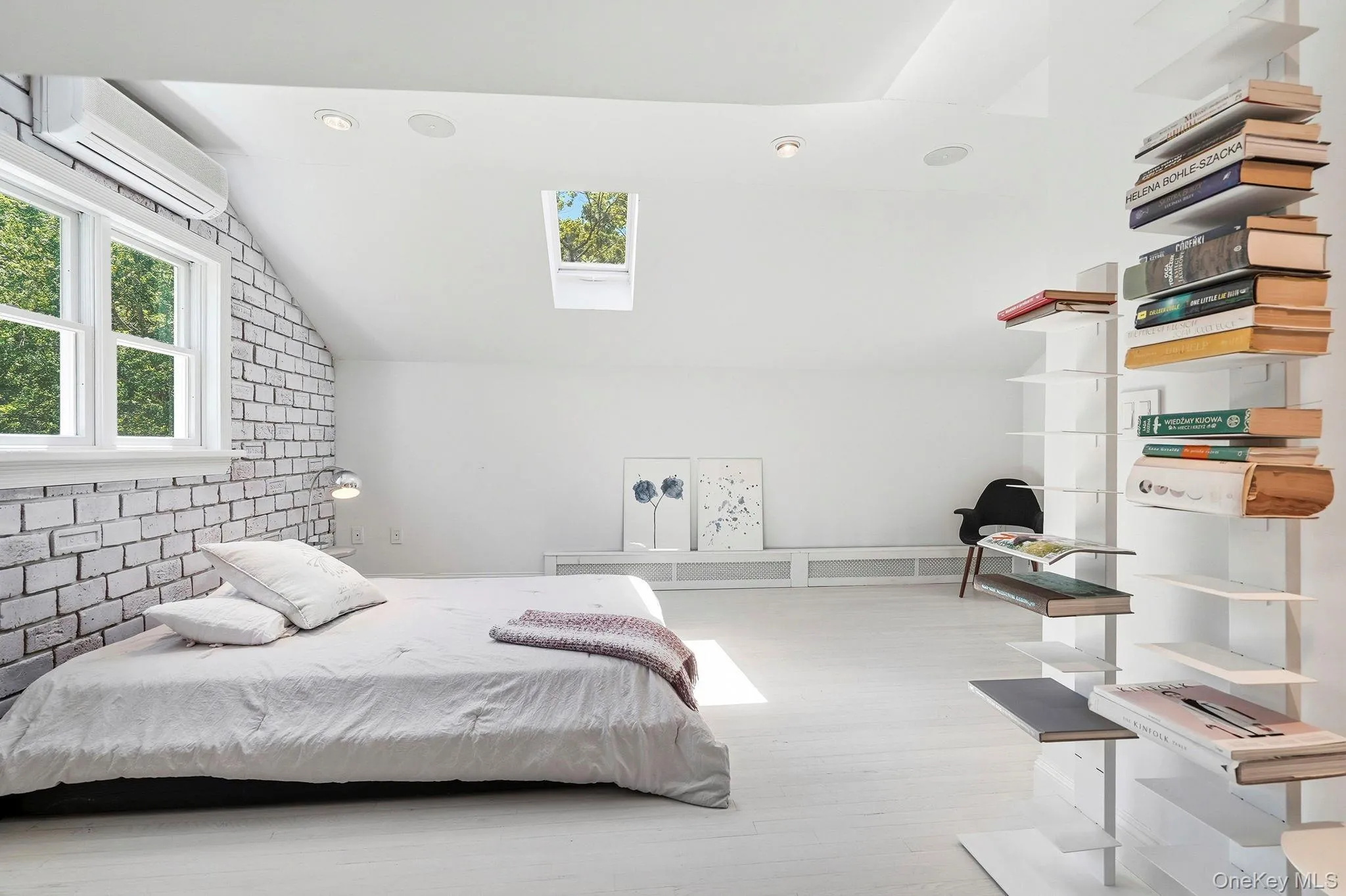 Second ensuite, up to 3rd floor, vaulted ceiling, lots of space. Featuring whitewashed brick that is also woven throughout the home, lending warmth and a contemporary feel. Second ensuite, up to 3rd floor, vaulted ceiling, lots of space. Featuring whitewashed brick that is also woven throughout the home, lending warmth and a contemporary feel.