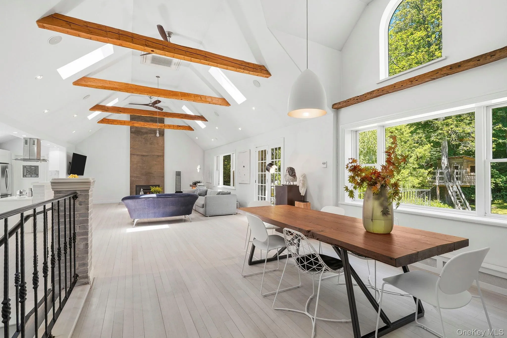 Open and airy, a view of the dining room towards the living room. Open and airy, a view of the dining room towards the living room.