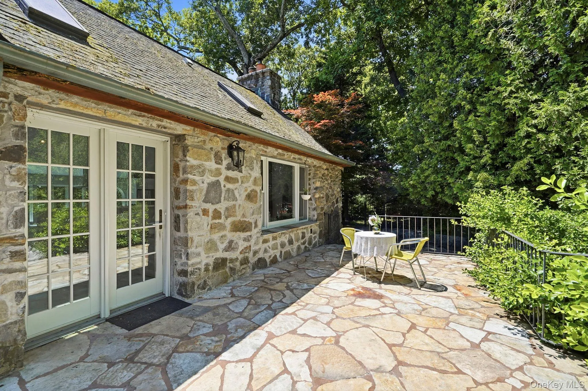 Flagstone patio off the open concept living area. Flagstone patio off the open concept living area.