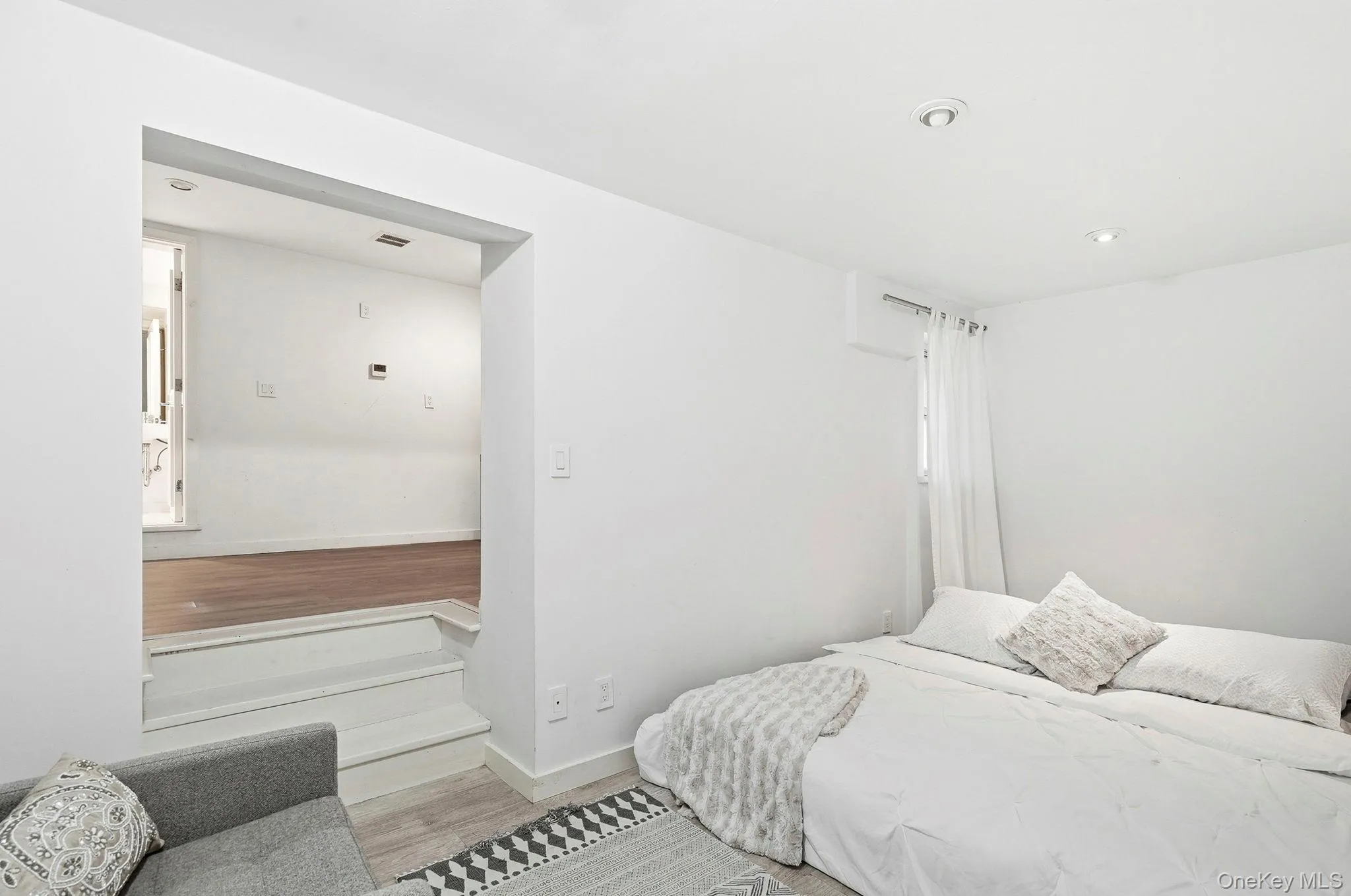 First floor bedroom behind the grand staircase is a suite of rooms, perfect for au pair, office space. There is a French door out to the rear garden First floor bedroom behind the grand staircase is a suite of rooms, perfect for au pair, office space. There is a French door out to the rear garden