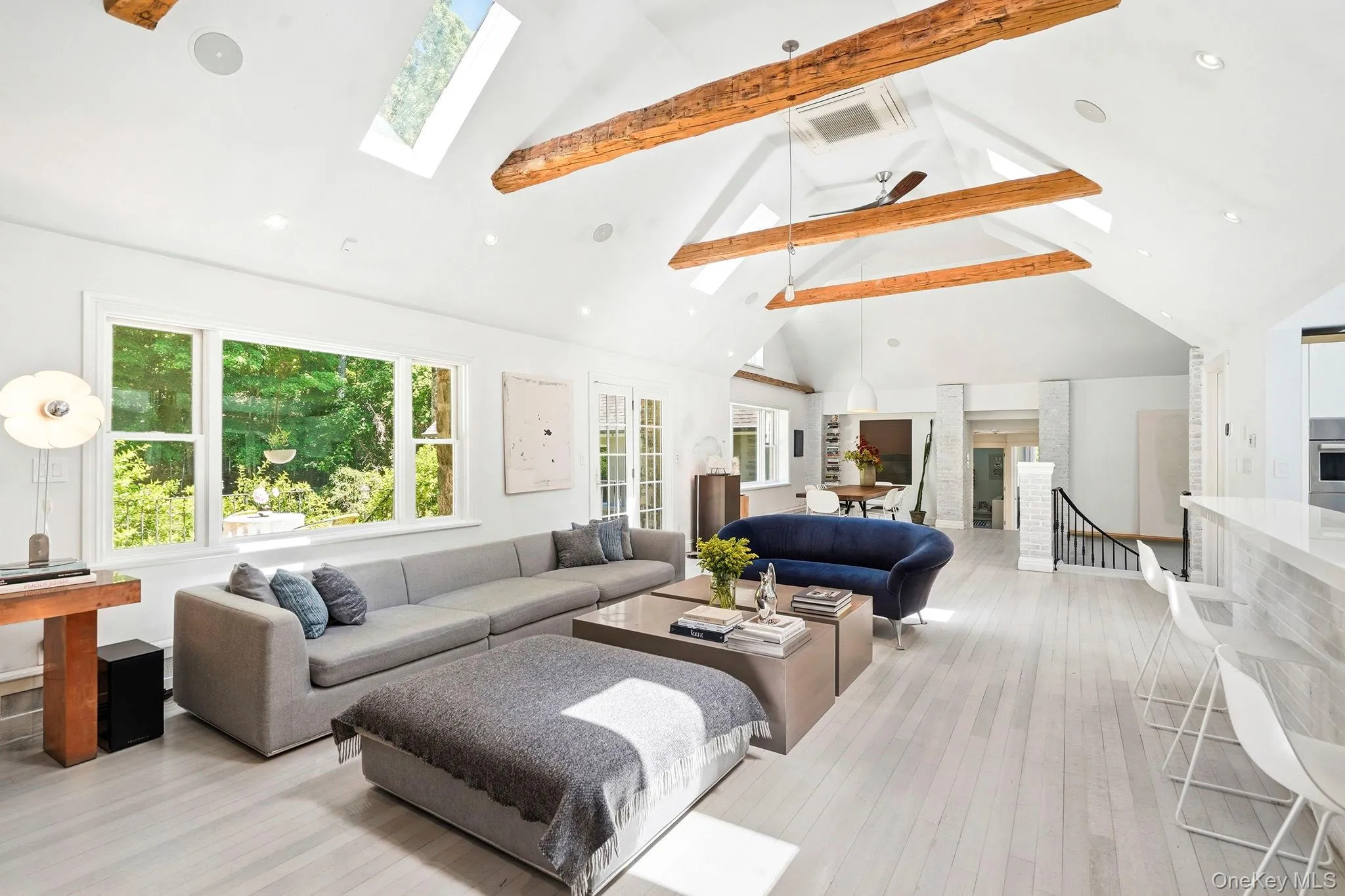 Stunning architectural features; vaulted ceilings, hand-hewn beams, and skylights creates a blend of rustic warmth and modern, airy luxury. These elements naturally open up a space while adding texture and abundant natural light. Stunning architectural features; vaulted ceilings, hand-hewn beams, and skylights creates a blend of rustic warmth and modern, airy luxury. These elements naturally open up a space while adding texture and abundant natural light.