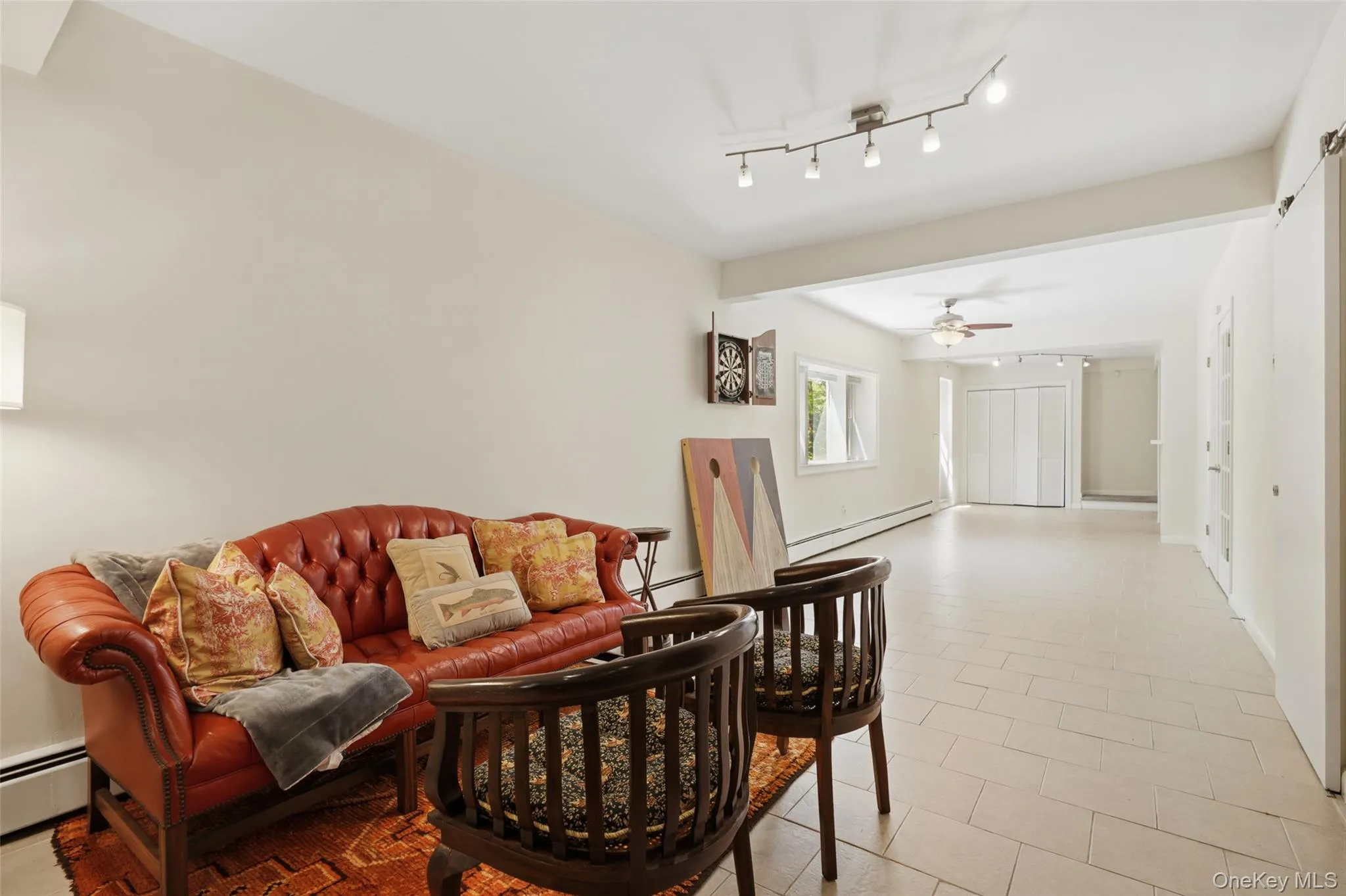 Alternate view of lower level toward walk out door. Alternate view of lower level toward walk out door.