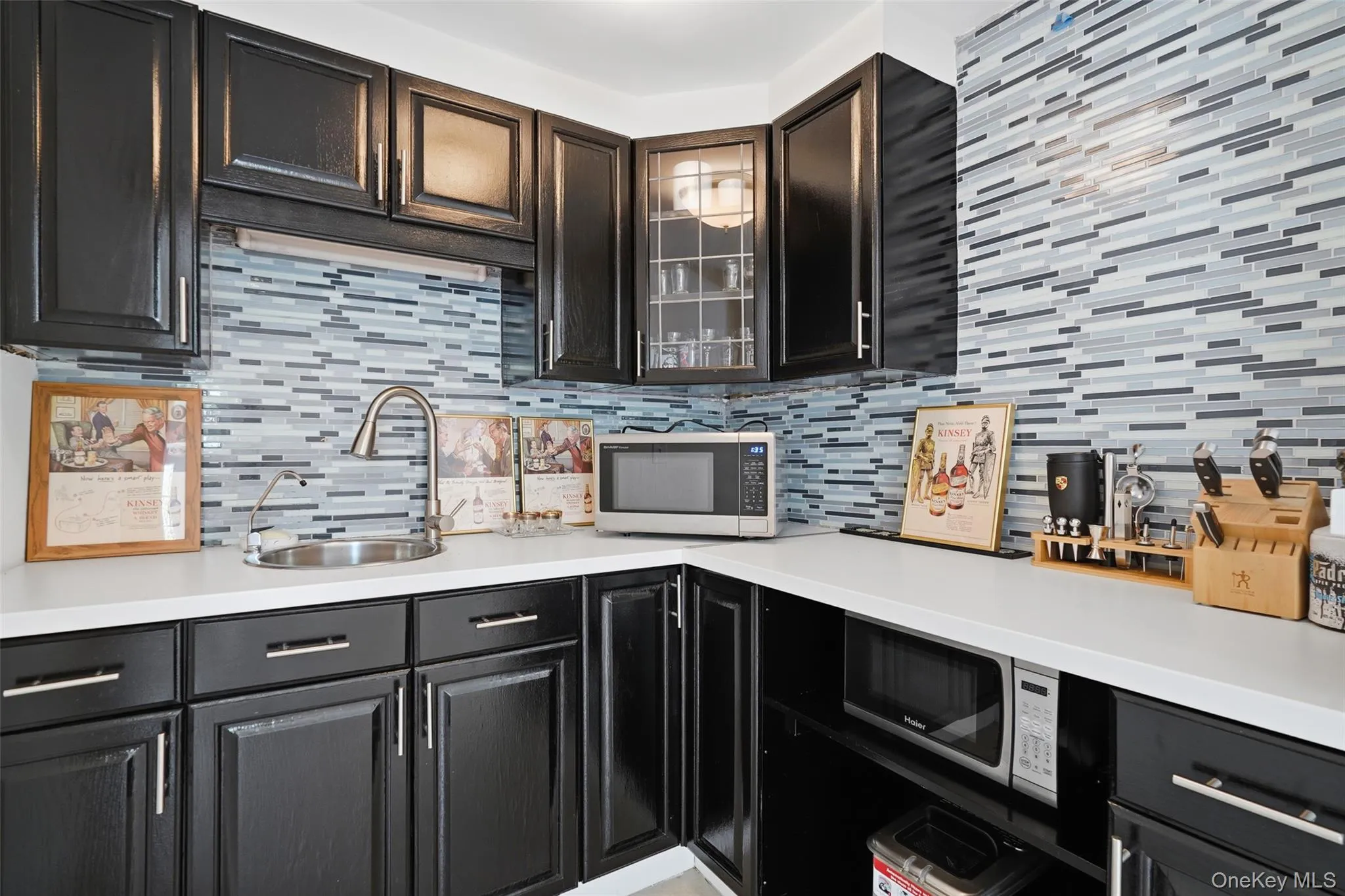 Close up view of lower level wet bar. Close up view of lower level wet bar.